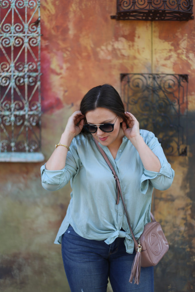 Ashley from Two Peas in a Prada shares her favorite flattering top. 