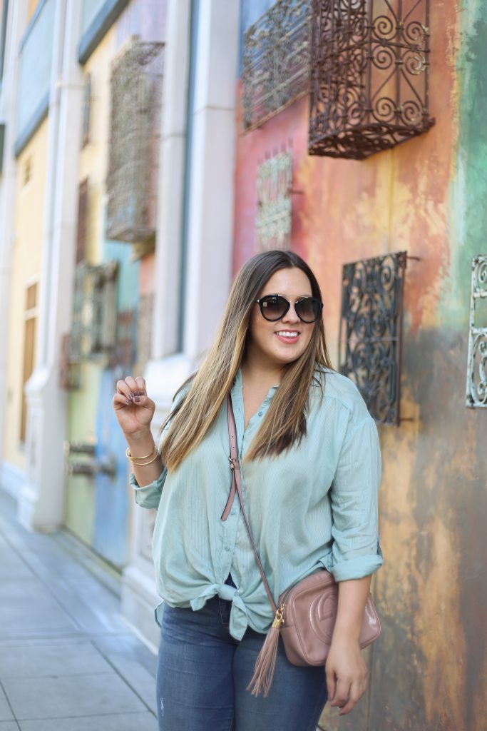 Ashley from Two Peas in a Prada shares her favorite flattering top. 