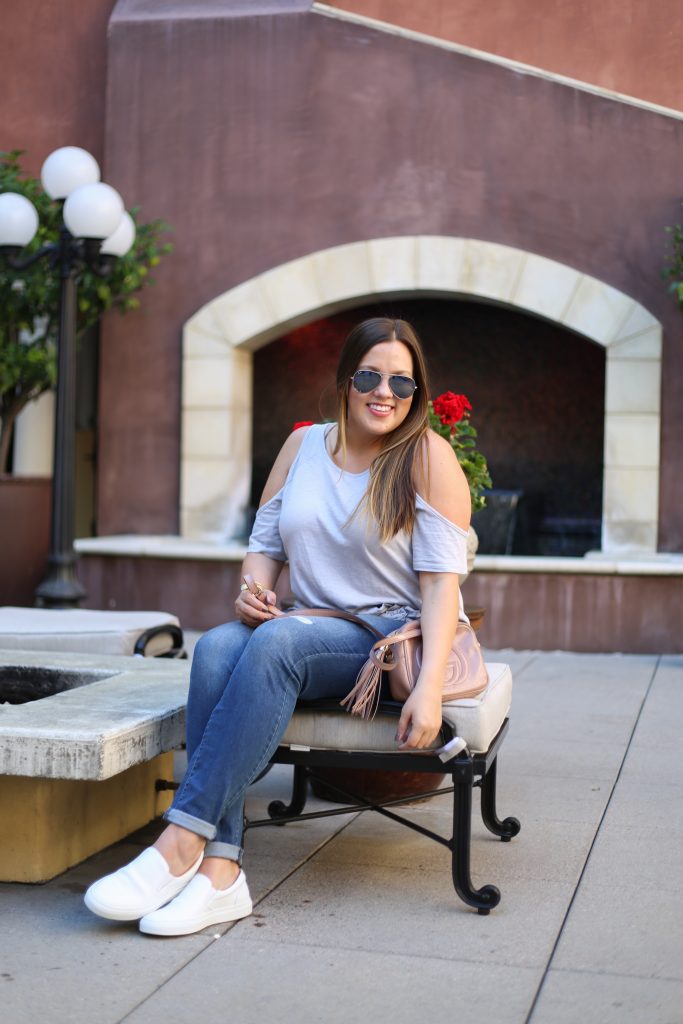 Ashley from Two Peas in a Prada wears GREATS sneakers at Hotel Valencia on Santana Row. 