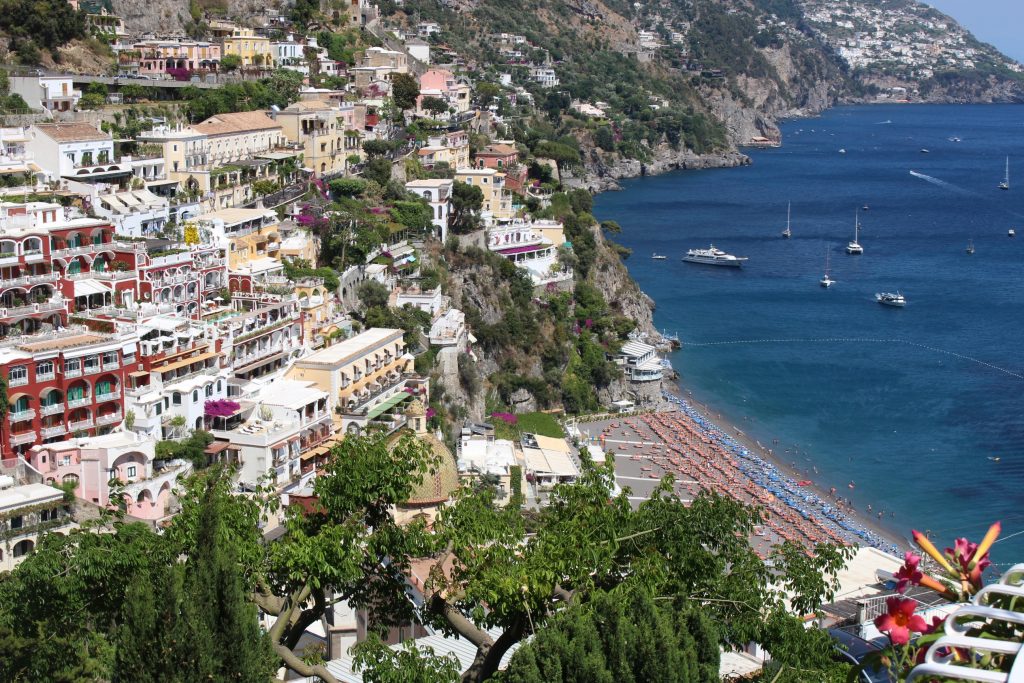 Ashley Zeal from Two Peas in a Prada shares her Positano Travel Guide. She shares where to eat, what to do and where to stay in Positano & the Amalfi Coast.