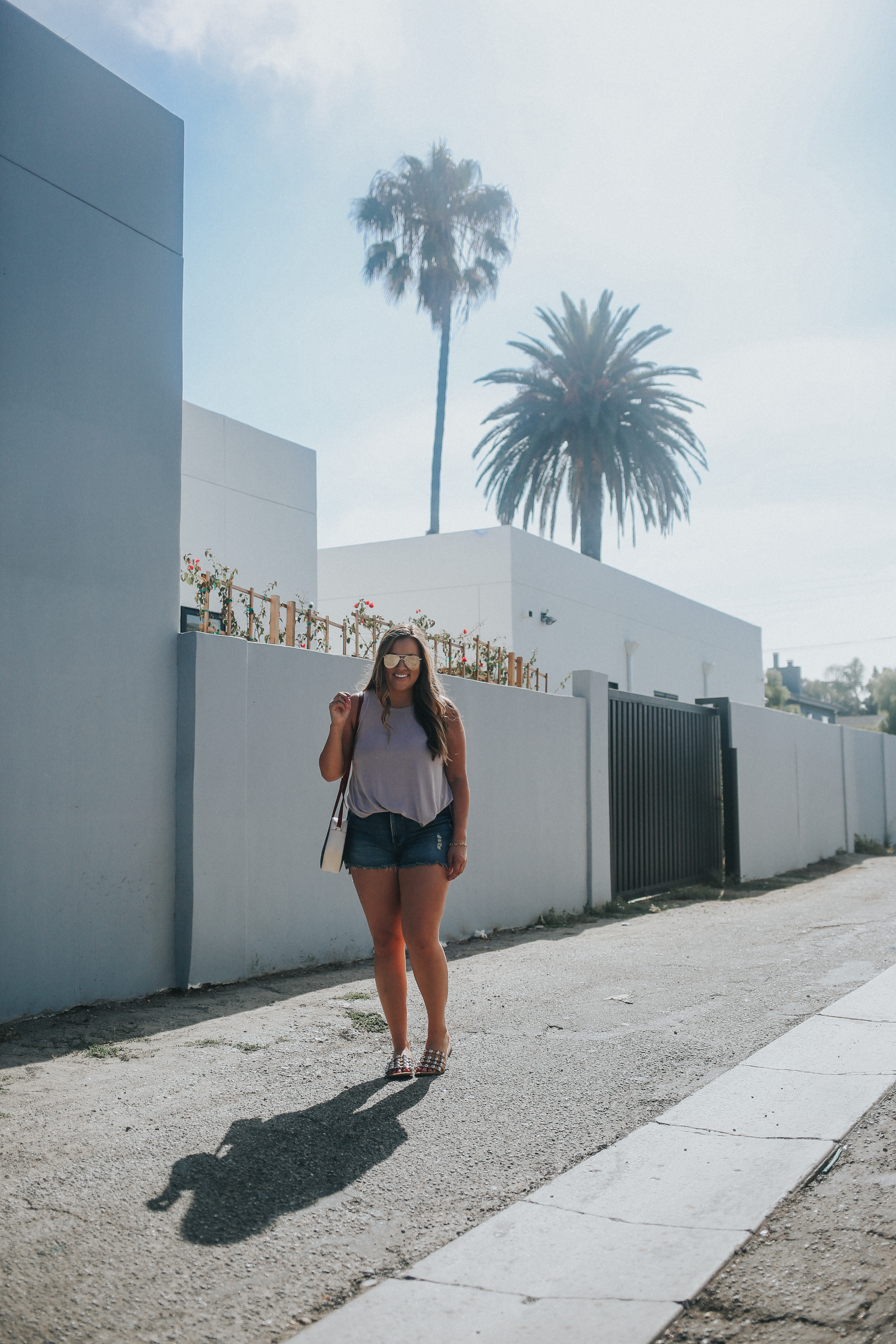 Ashley Zeal from Two Peas in a Prada shares the best weekend deals and an outfit she wore in Los Angeles. Shot in Venice Beach. 