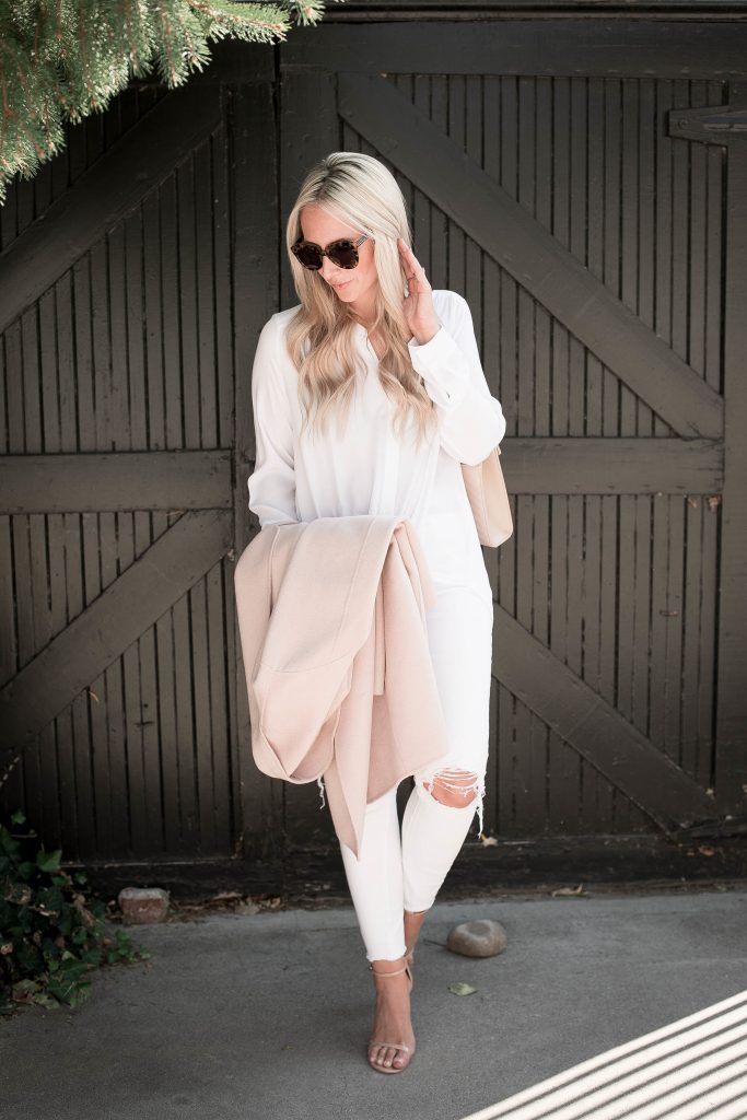 Emily Farren Wieczorek of Two Peas in a Prada shows you how to wear blush for fall - paired with a YSL nude purse, the Stuart Wietzman pumps, and head to toe white. 