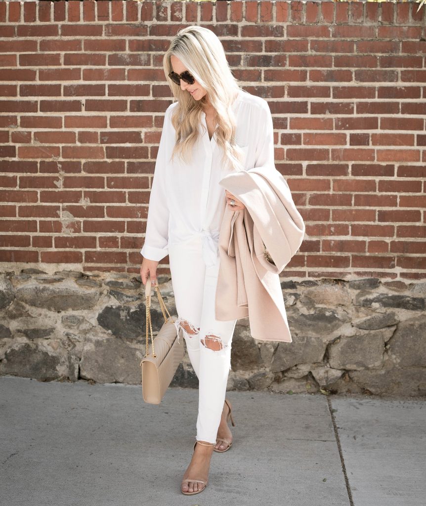 Emily Farren Wieczorek of Two Peas in a Prada shows you how to wear blush for fall - paired with a YSL nude purse, the Stuart Wietzman pumps, and head to toe white. 