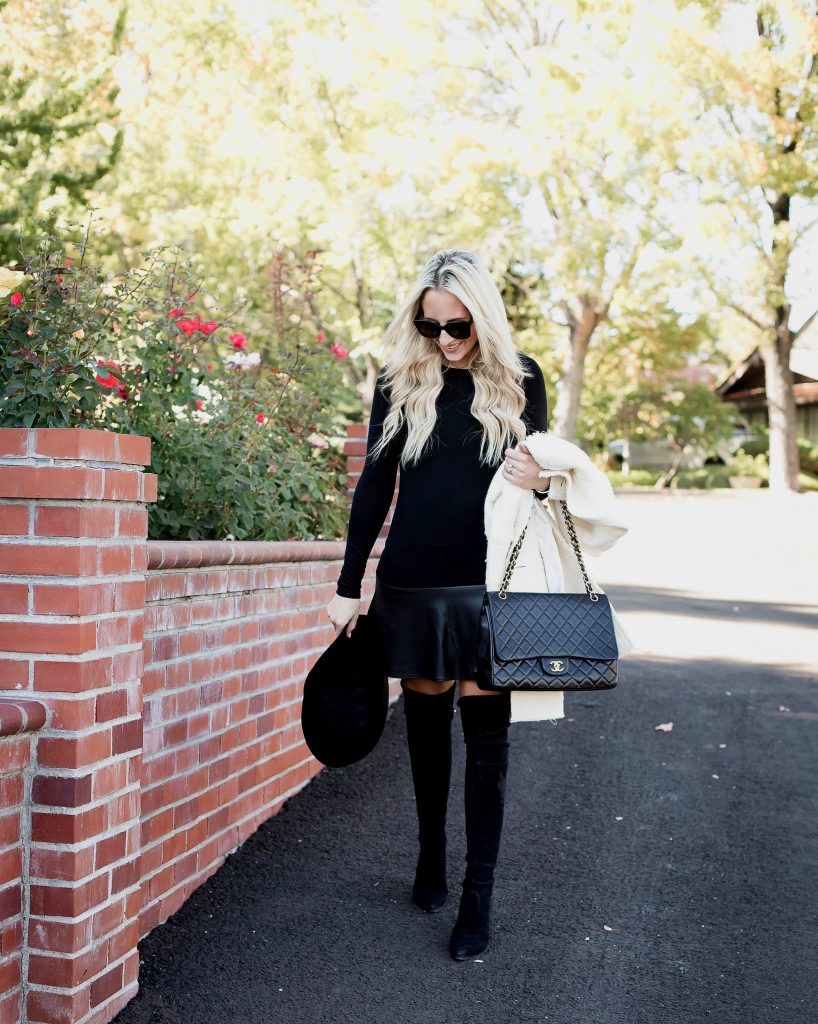 Emily Farren Wieczorek of Two Peas in a Prada wears a leather mini dress with Stuart Weitzman OTK boots, a Chanel large flap bag, and celine sunglasses. And talks about her love for fall, OTK boots, and her favorite crock pot recipe. 