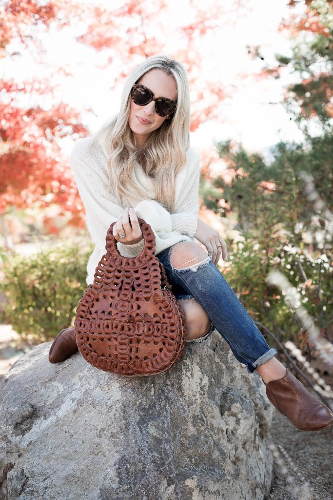 Emily Farren Wieczorek of Two Peas in a Prada wears a Patricia Nash handbag that is perfect from fall in collaboration with Zappos. 