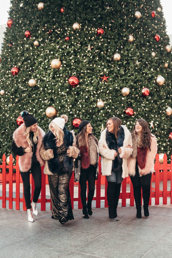 Ashley Zeal from Two Peas in a Prada grabs her best gal pals and heads to the Union Square Christmas tree. The girls are wearing Sole Society. 