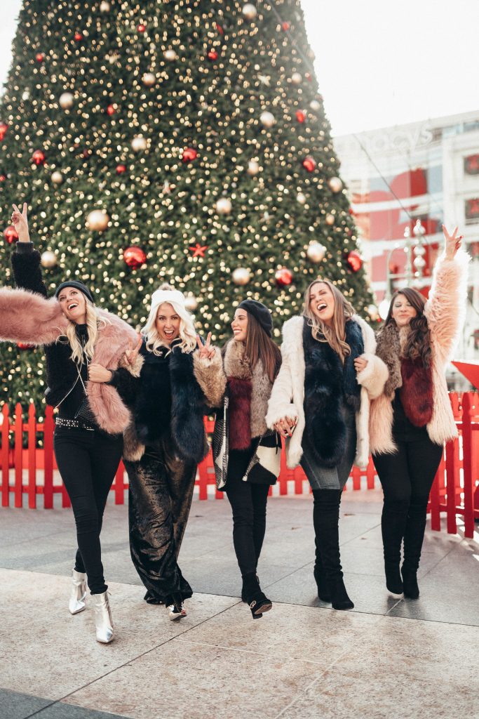 Ashley Zeal from Two Peas in a Prada grabs her best gal pals and heads to the Union Square Christmas tree. The girls are wearing Sole Society. 