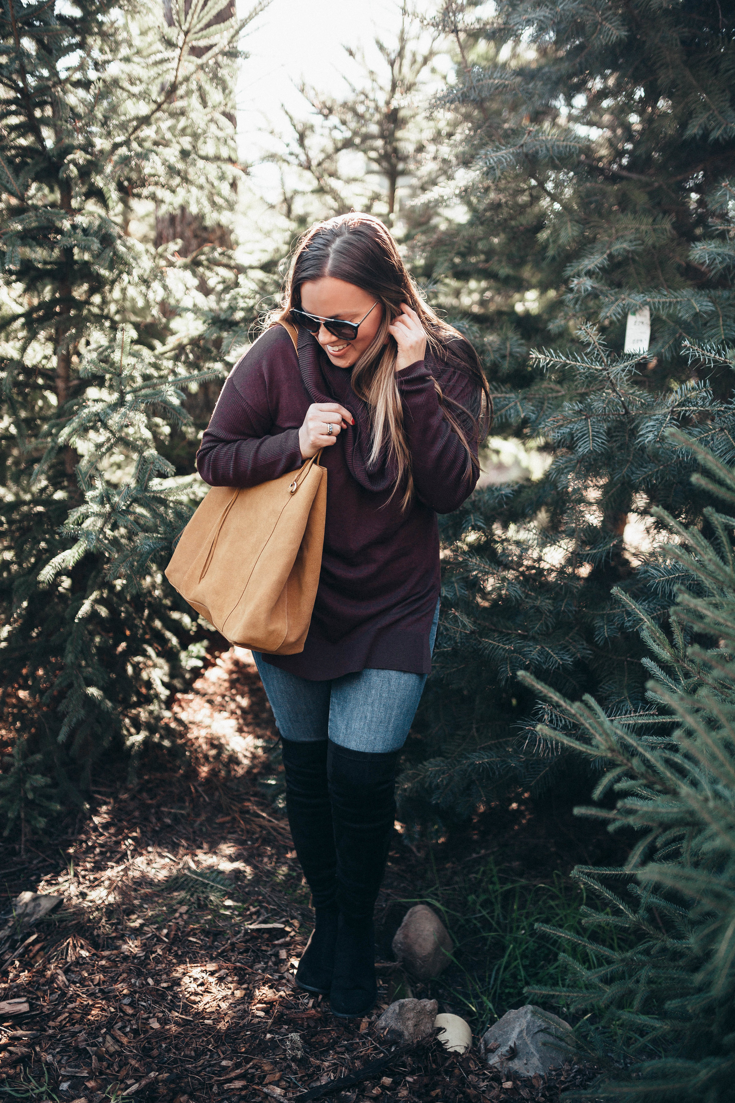 Ashley Zeal from Two Peas in a Prada wears the Hobo Kingston Tote available from Zappos. Shot at Grandma Buddy's Christmas Tree Farm. 