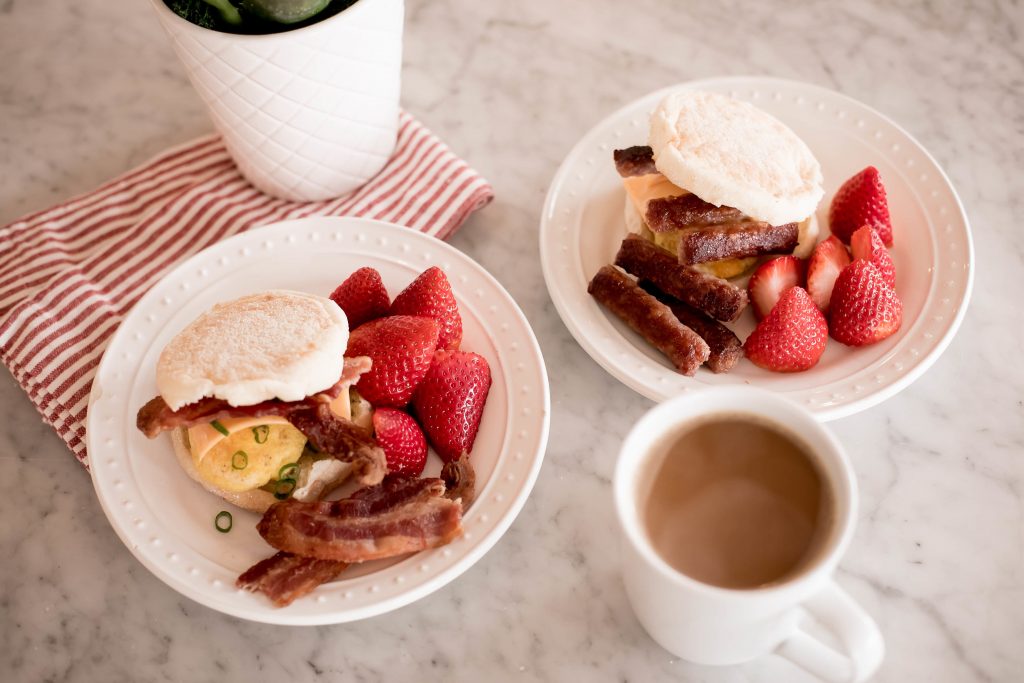 Emily Farren Wieczorek of Two Peas in a Prada shares her easy, make ahead breakfast sammie recipe made with Farmer John All Natural Bacon and All Natural Sausage.