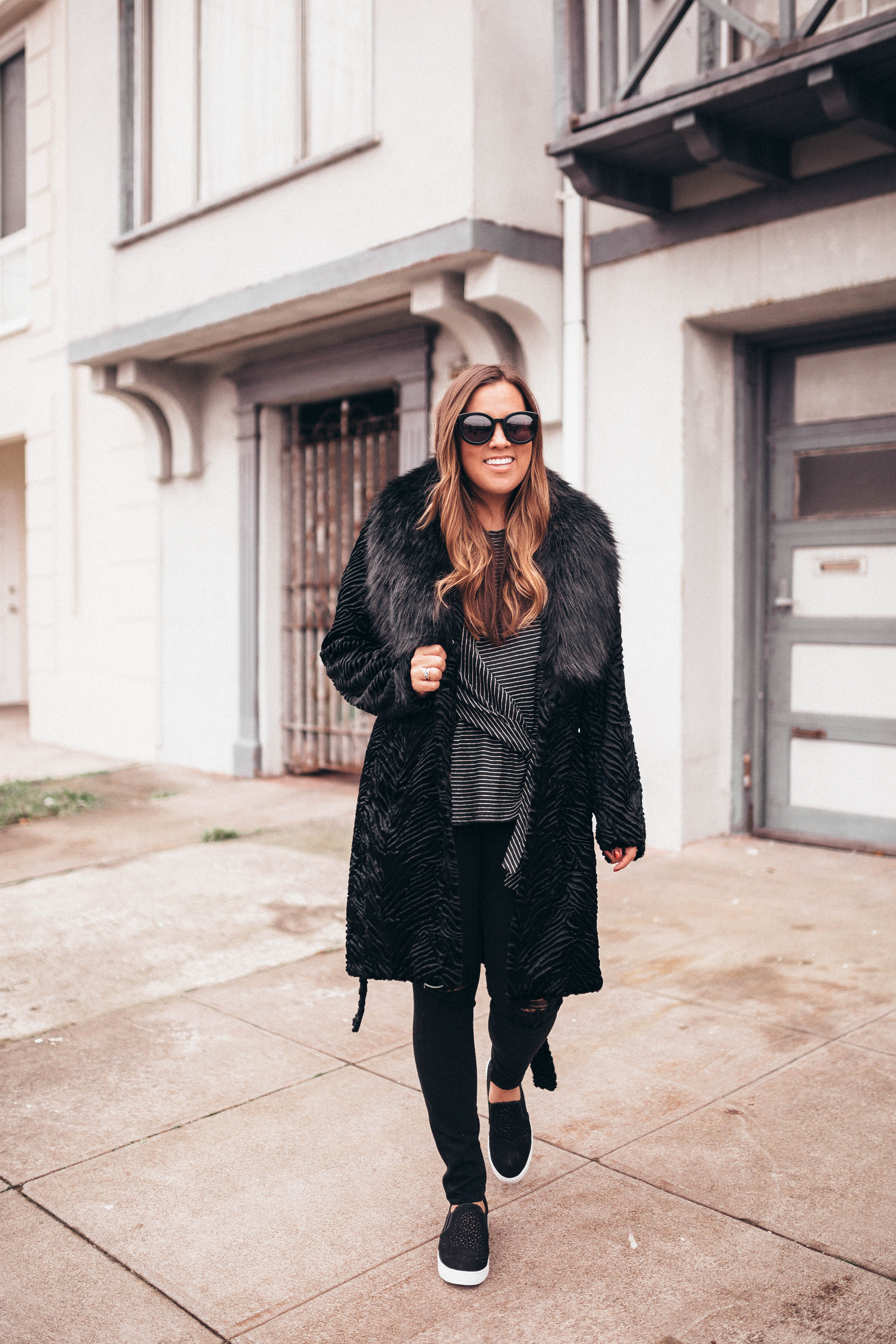 Ashley Zeal from Two Peas in a Prada shares a head to toe all black outfit. 