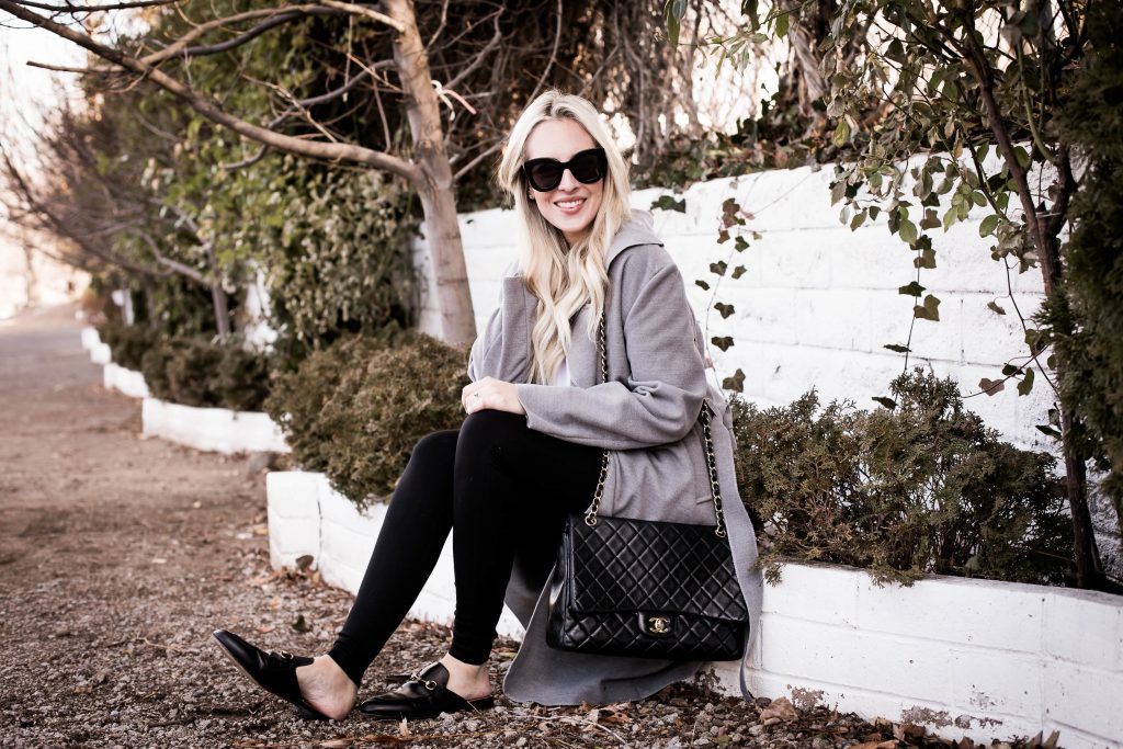 Emily Farren Wieczorek of Two Peas in a Prada wears her favorite $38 coat, celine sunglasses, a chanel large flap bag, and gucci Princetown loafers. 
