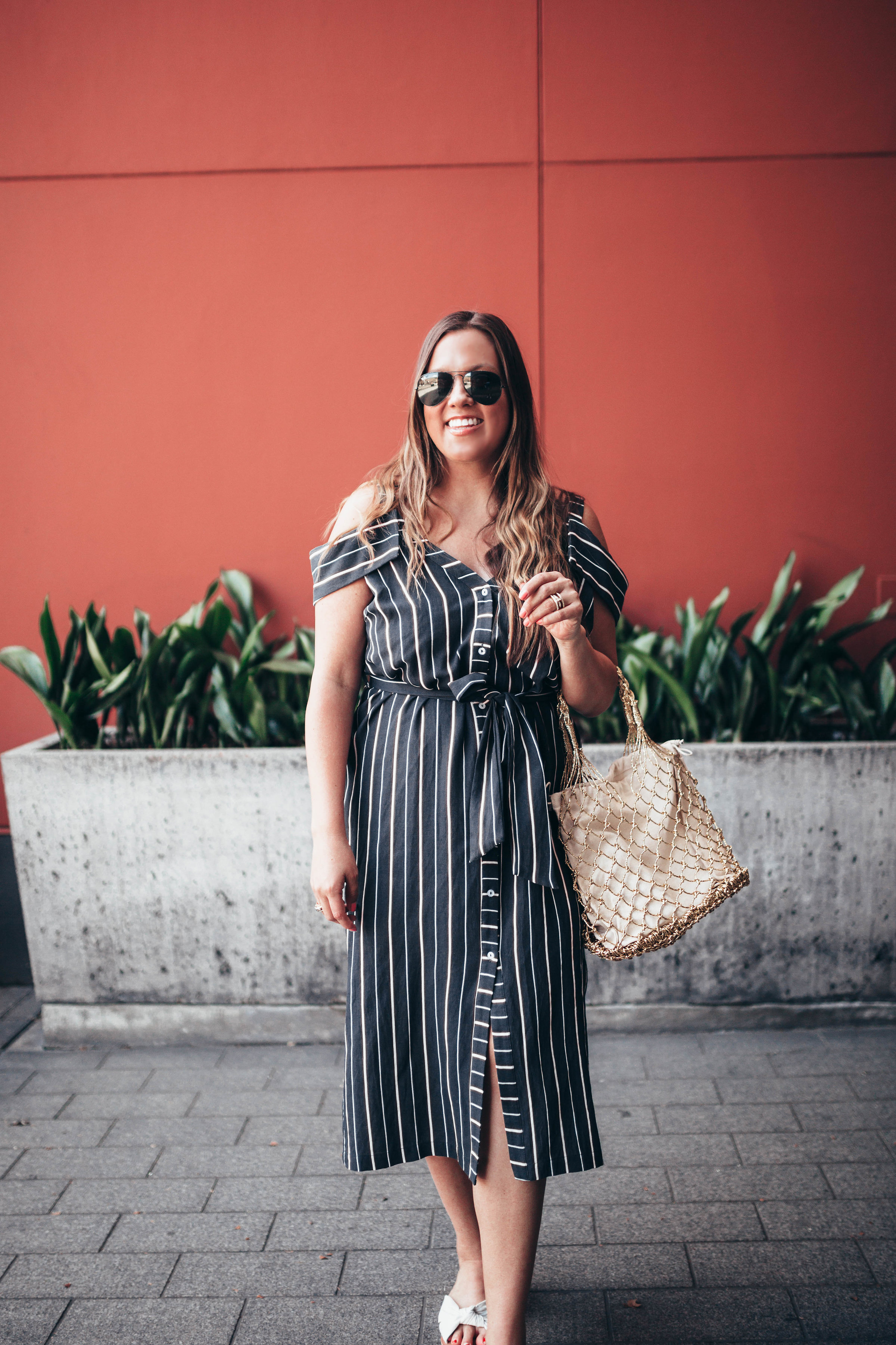 Ashley Zeal from Two Peas in a Prada shares the best spring dresses under $60. Her entire outfit is available from Nordstrom. 