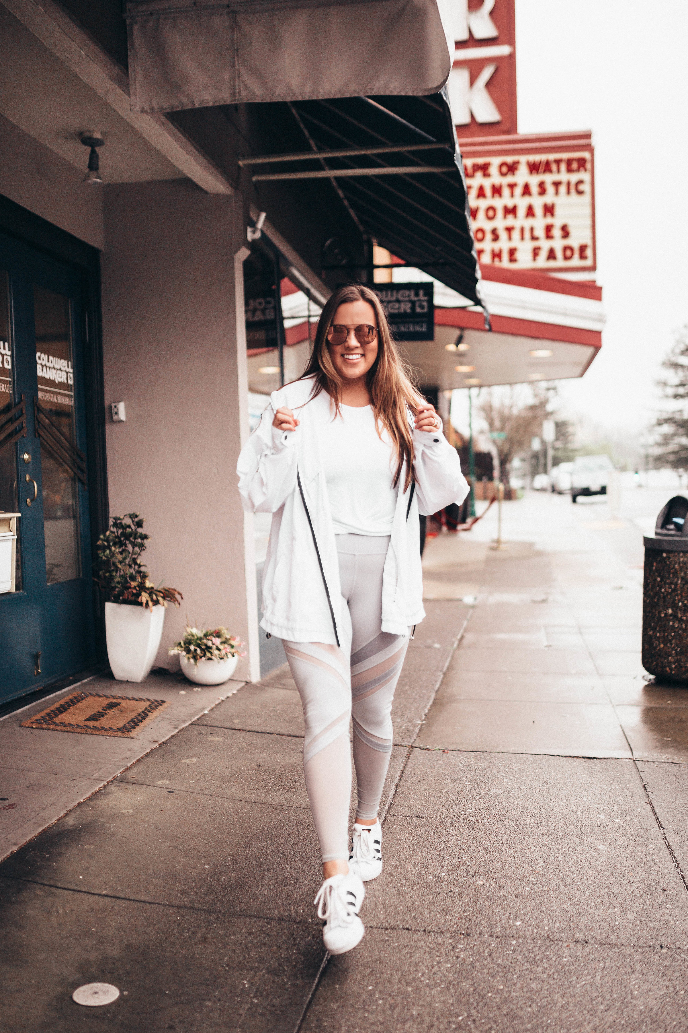 Ashley Zeal from Two Peas in a Prada shares her favorite activewear at Nordstrom. She is wearing Alo Yoga, Adidas and BlankNYC. 