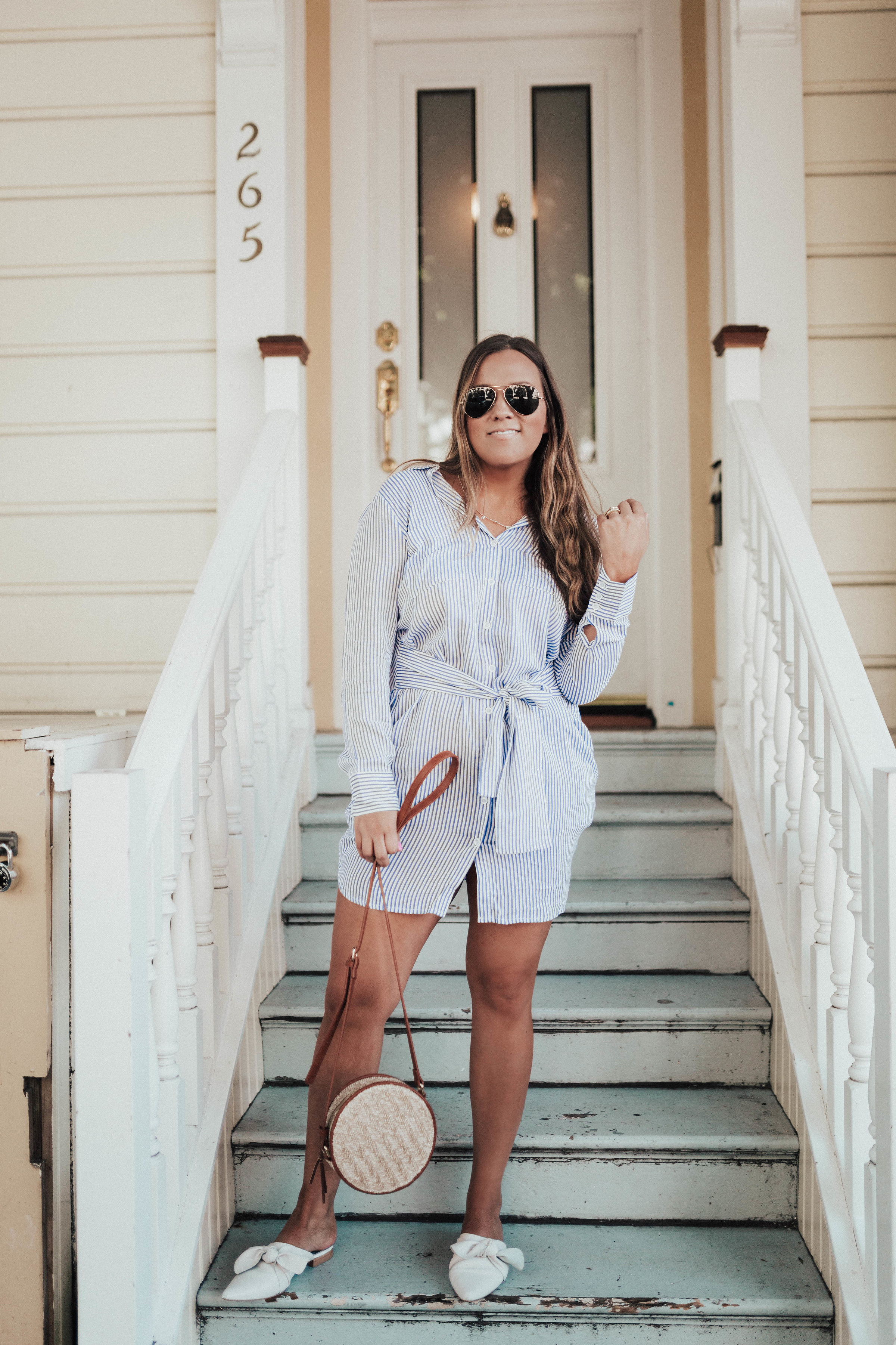 Ashley Zeal from Two Peas in a Prada shares their May Top Ten sellers featuring their best selling items from the month of May including this shirt dress!