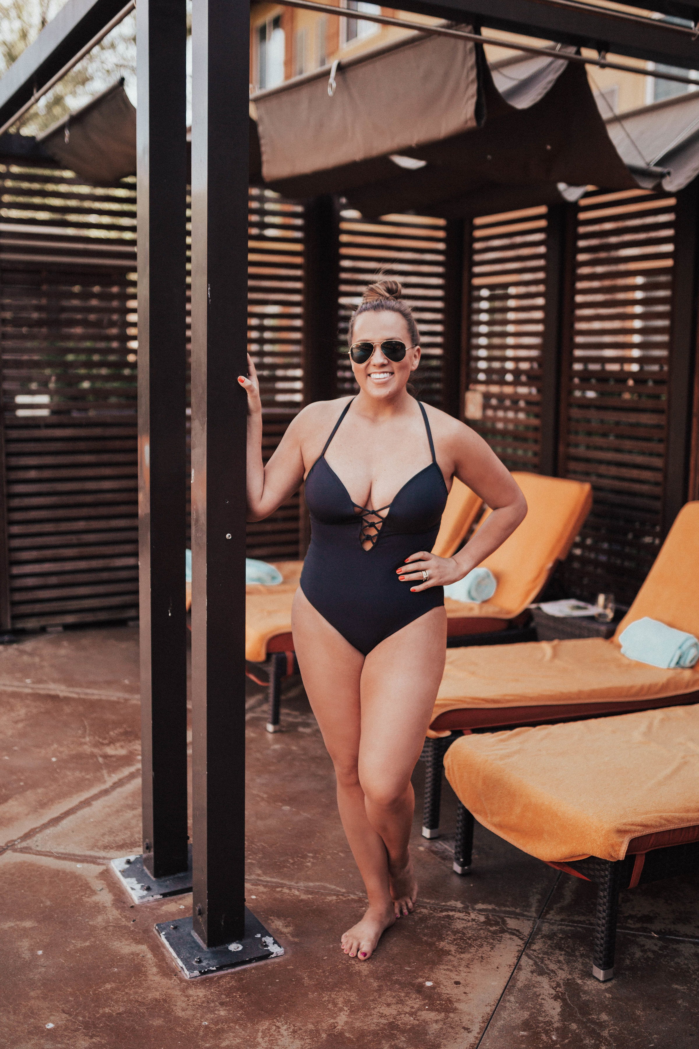 Ashley Zeal from Two Peas in a Prada shares her number one fashion tip: wearing a swimsuit as a bodysuit. She is wearing Bleu by Rod Beattie. 
