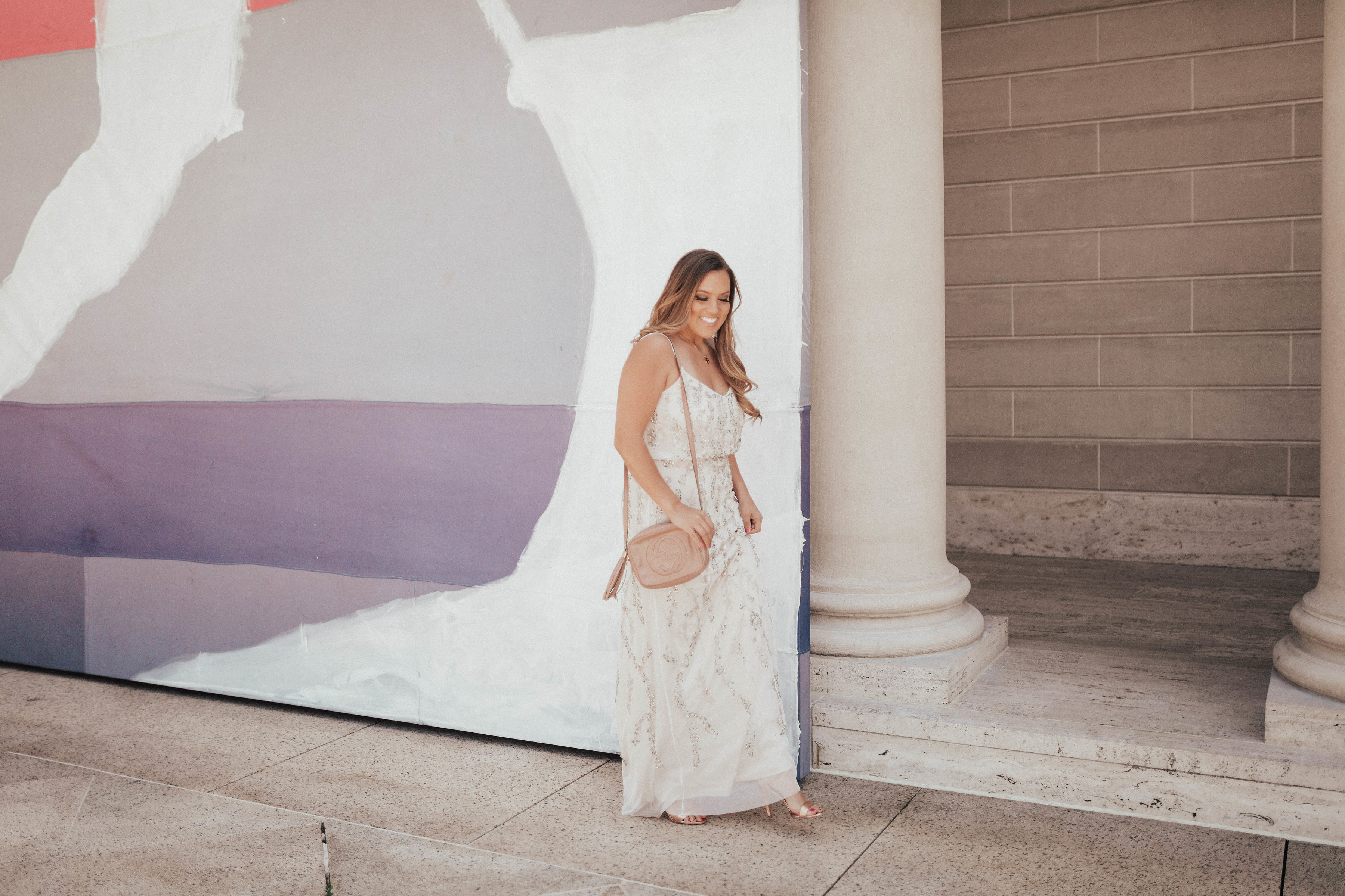 Ashley Zeal from Two Peas in a Prada partners with eBay bridal to share how to keep your bridesmaids on a budget! She is wearing Adrianna Papelll.