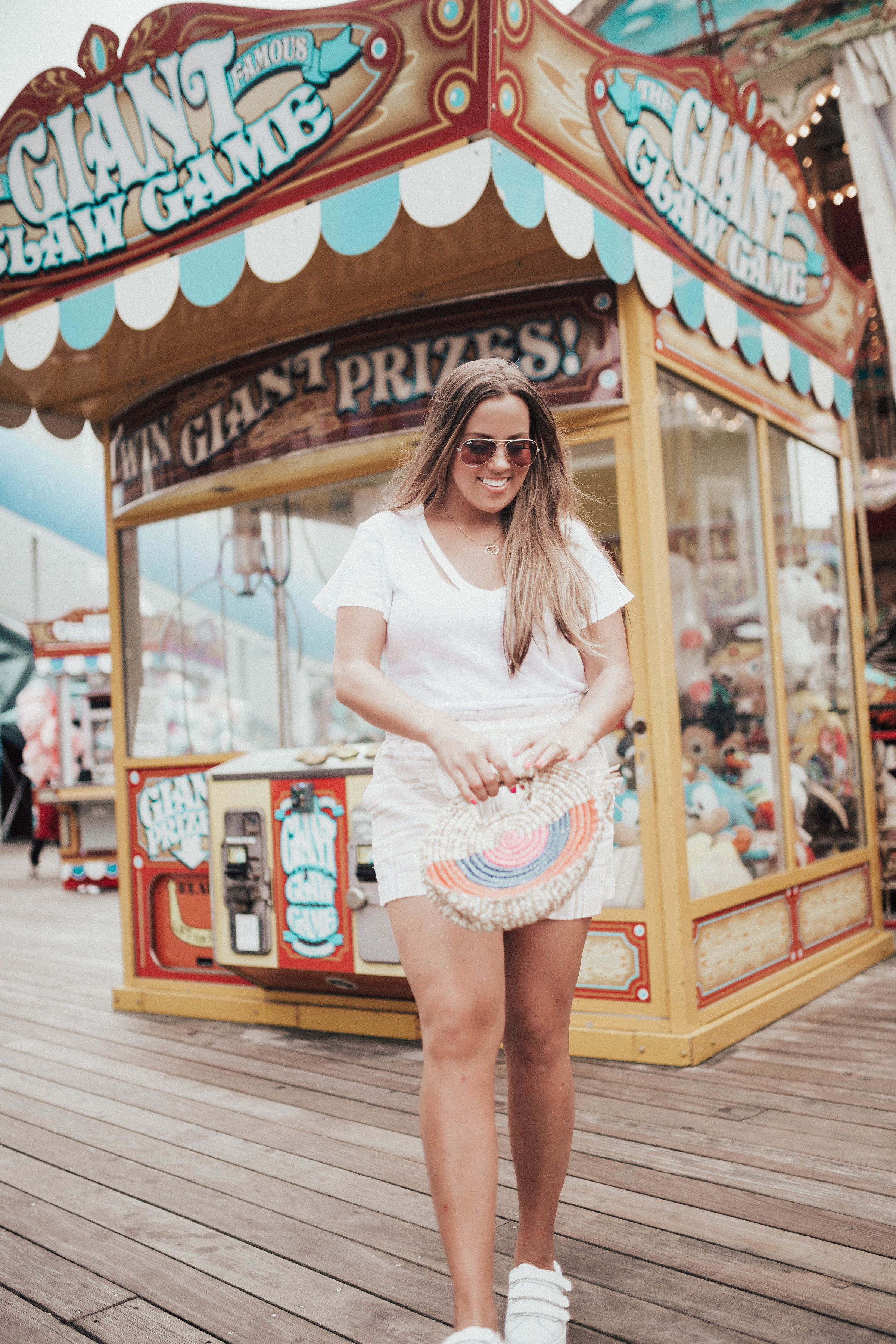 Ashley Zeal from Two Peas in a Prada shares her favorite summer shorts that aren't denim. She is wearing the BP. Stripe Linen Blend Shorts from Nordstrom. 
