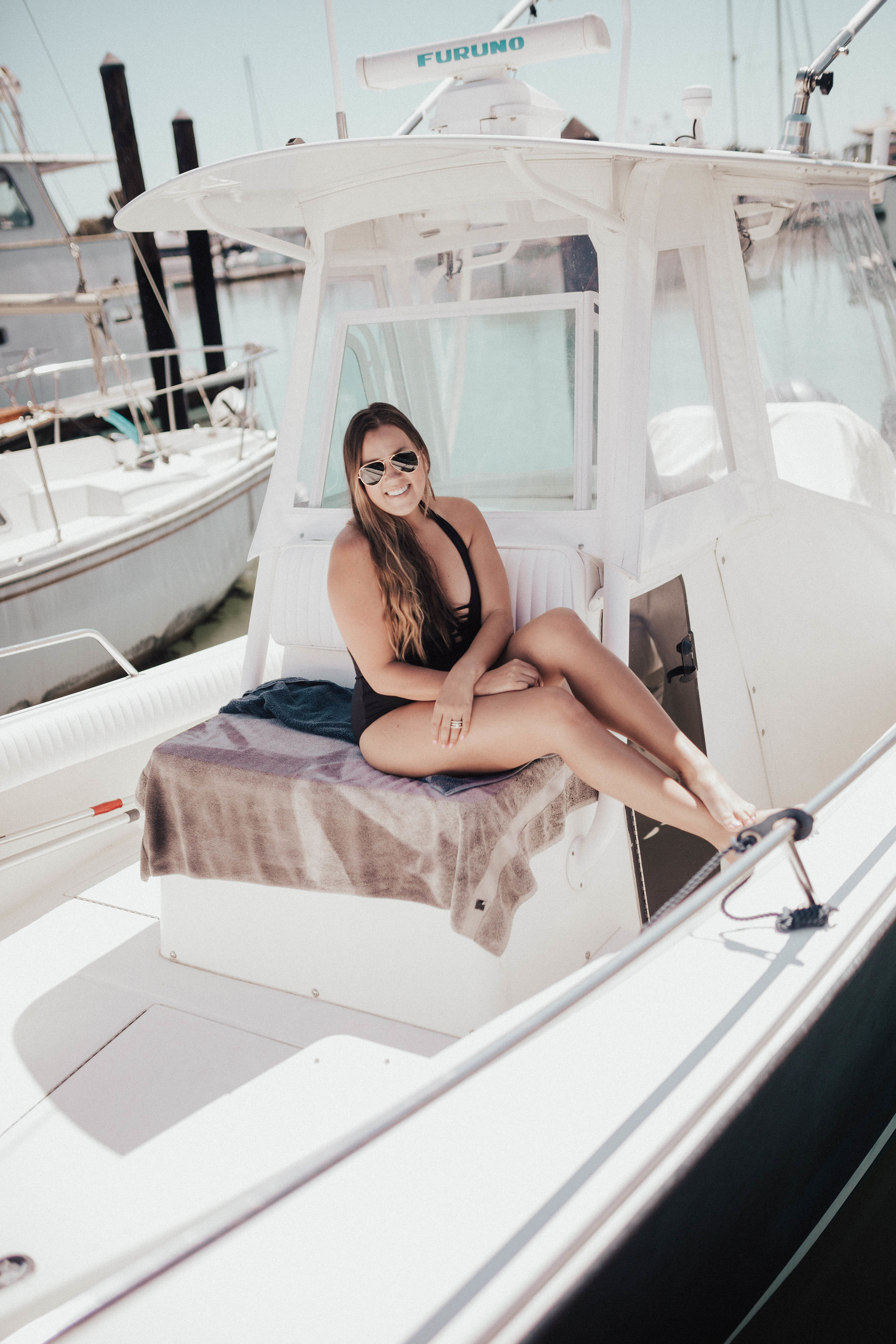 Ashley Zeal from Two Peas in a Prada shares why she loves one piece swimsuits. She is wearing the JETS by Jessika Allen Parallels Plunged One-Piece Swimsuit from Zappos. 