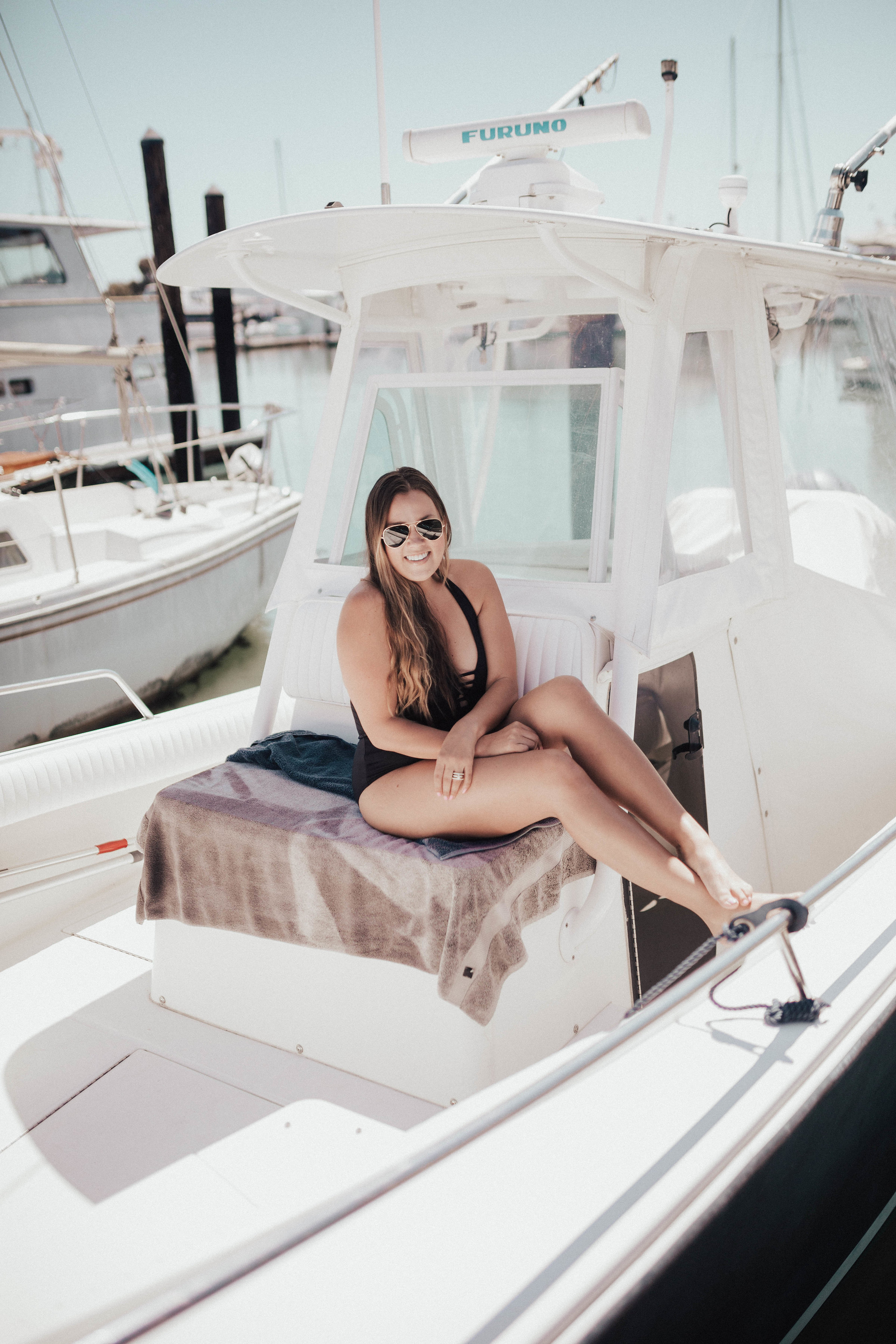 Ashley Zeal from Two Peas in a Prada shares why she loves one piece swimsuits. She is wearing the JETS by Jessika Allen Parallels Plunged One-Piece Swimsuit from Zappos. 