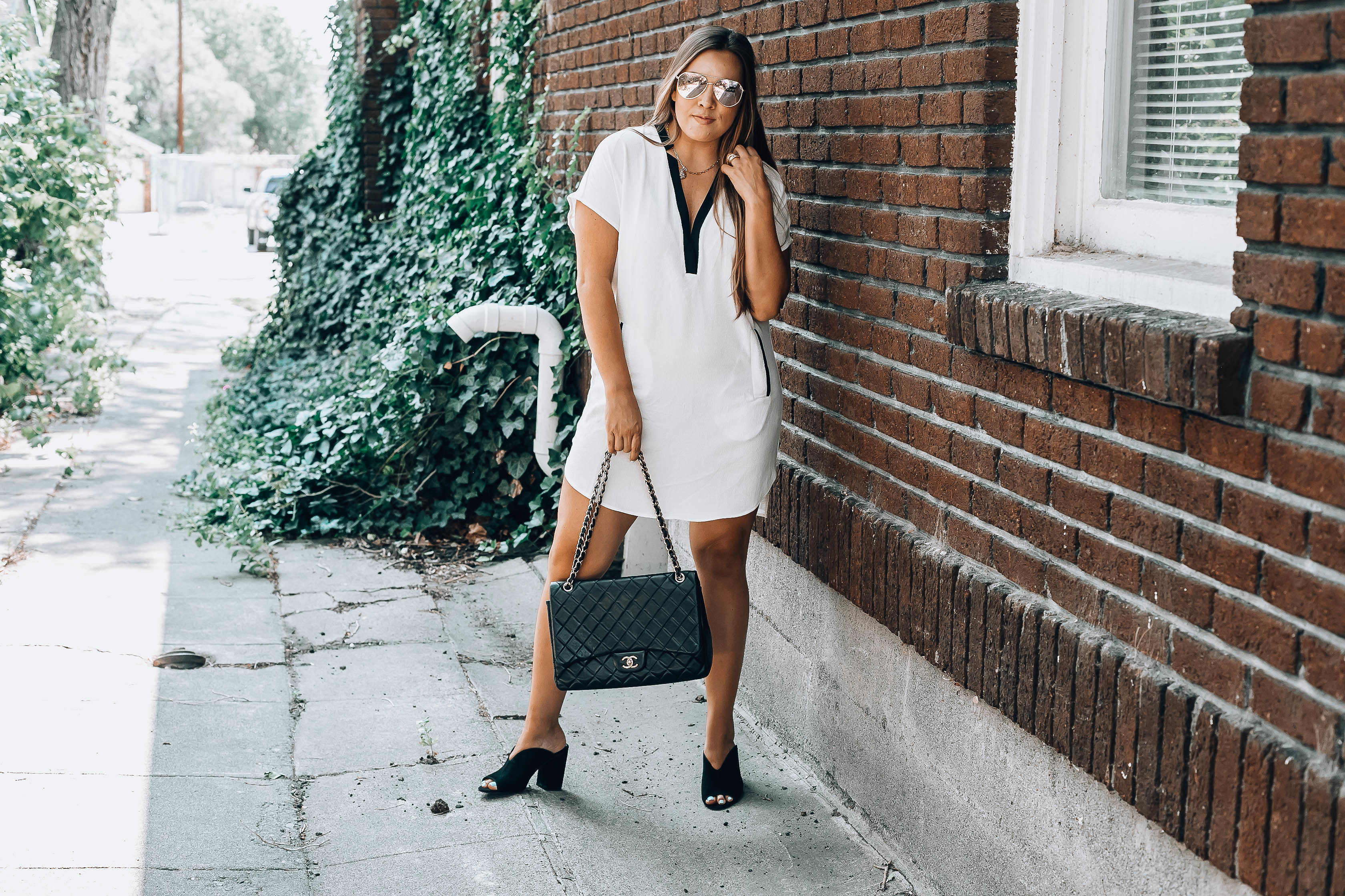 Ashley Zeal from Two Peas in a Prada shares a black and white dress under $50. Nordstrom Anniversary Sale 2018. 