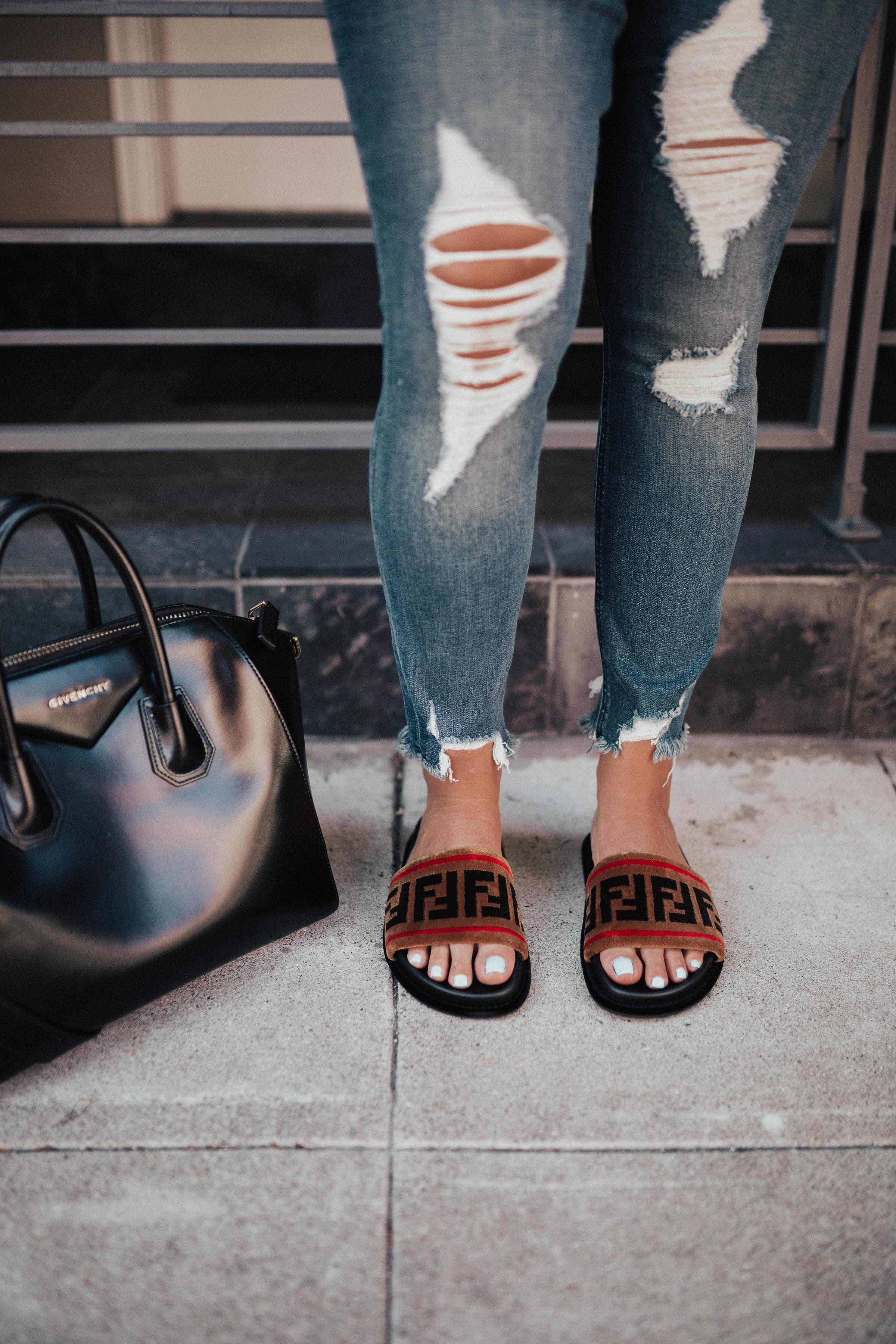 F is for Fendi. Ashley Zeal from Two Peas in a Prada wears the Fendi Logo Slides.