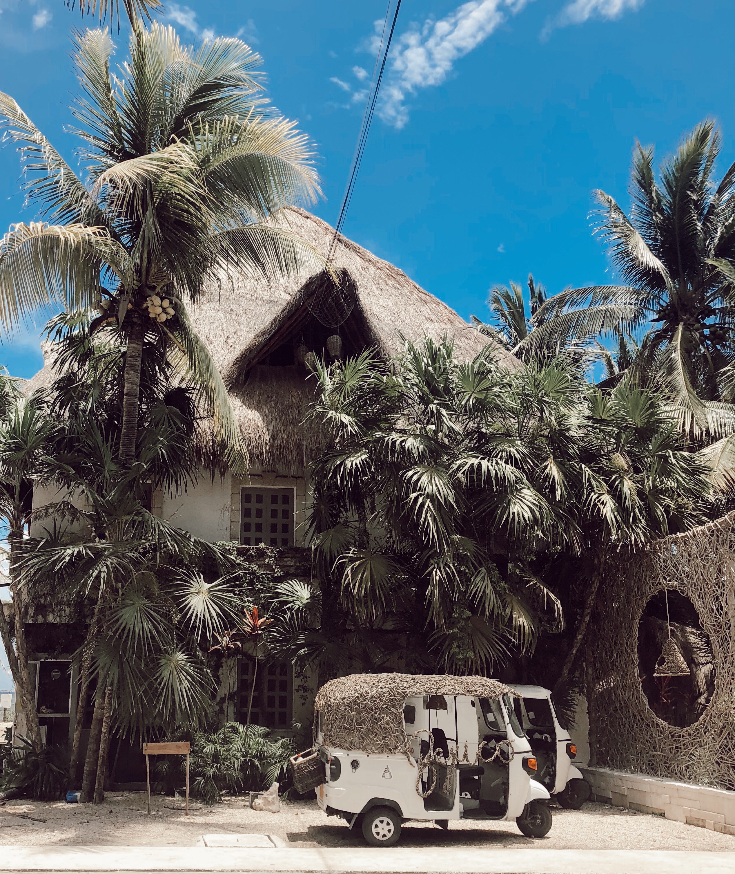 Ashley Zeal from Two Peas in a Prada shares her Tulum Travel Guide, including where to stay, eat, what to do, what to pack, and travel details.