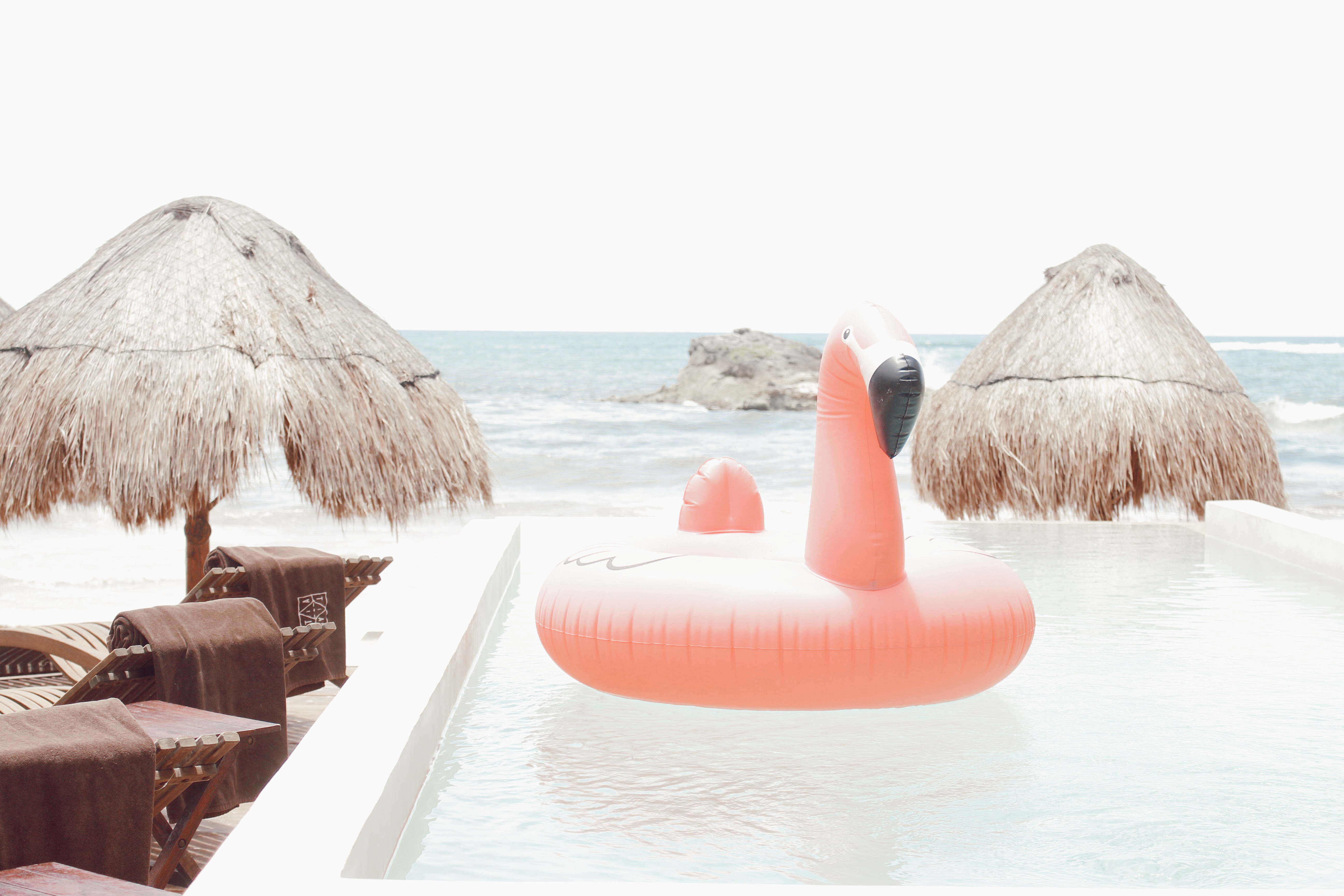 Ashley Zeal from Two Peas in a Prada shares her Tulum Travel Guide. The pool at Tata Tulum.