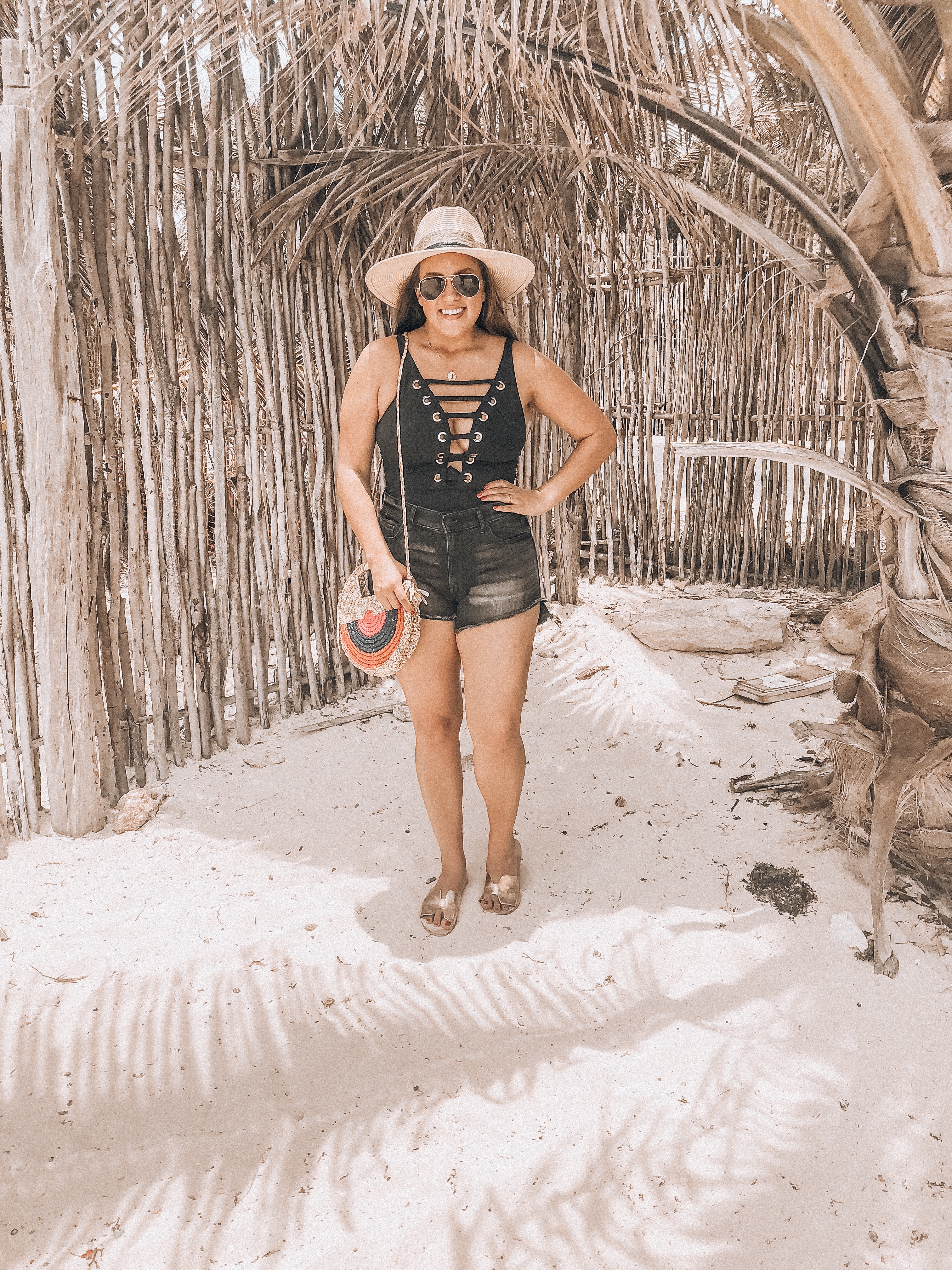 Ashley Zeal from Two Peas in a Prada shares her Tulum Travel Guide, including where to stay, eat, what to do, what to pack, and travel details.
