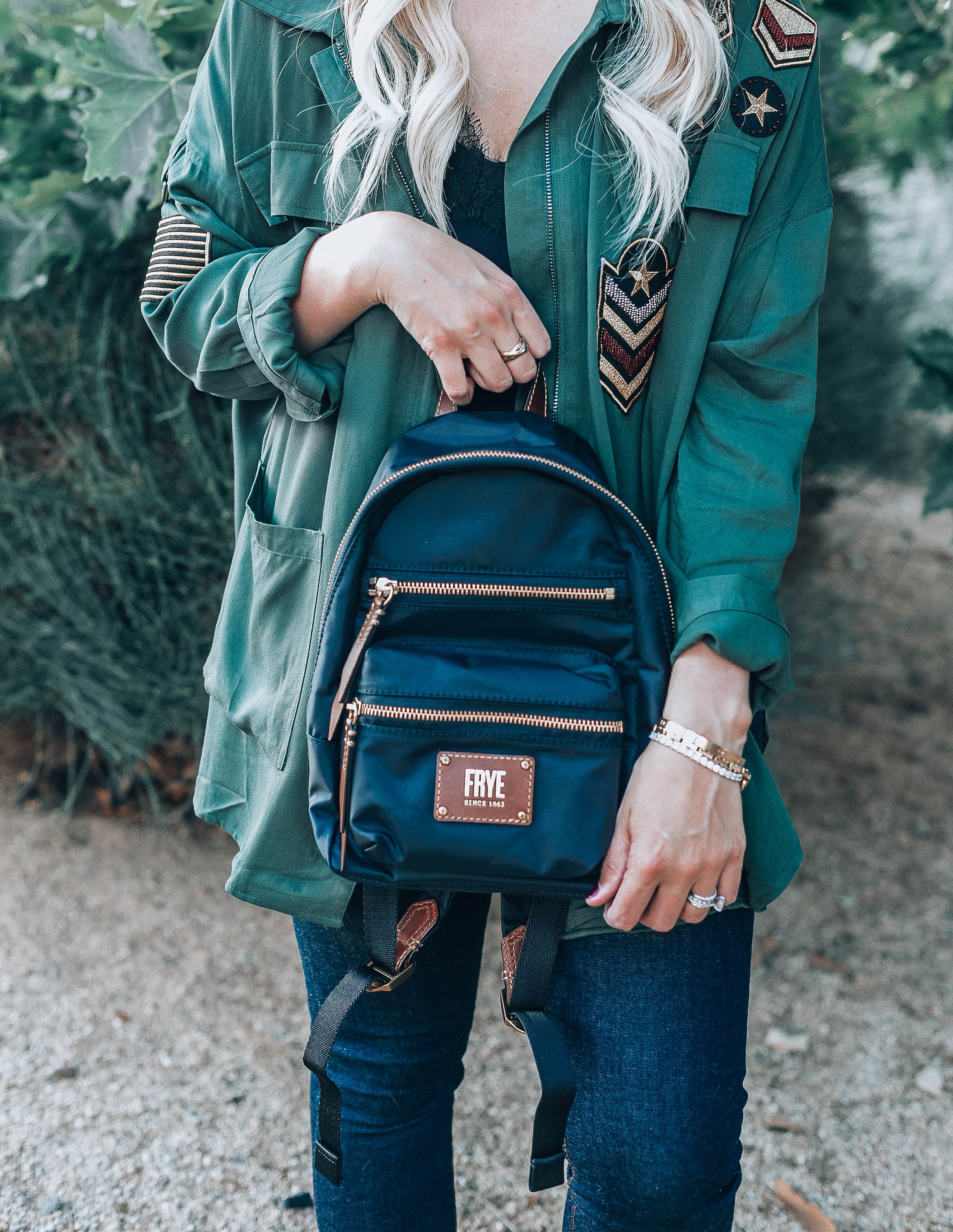 Emily Farren Wieczorek of Two Peas in a Prada talks about how her Frye Backpack helps her get going in the morning.