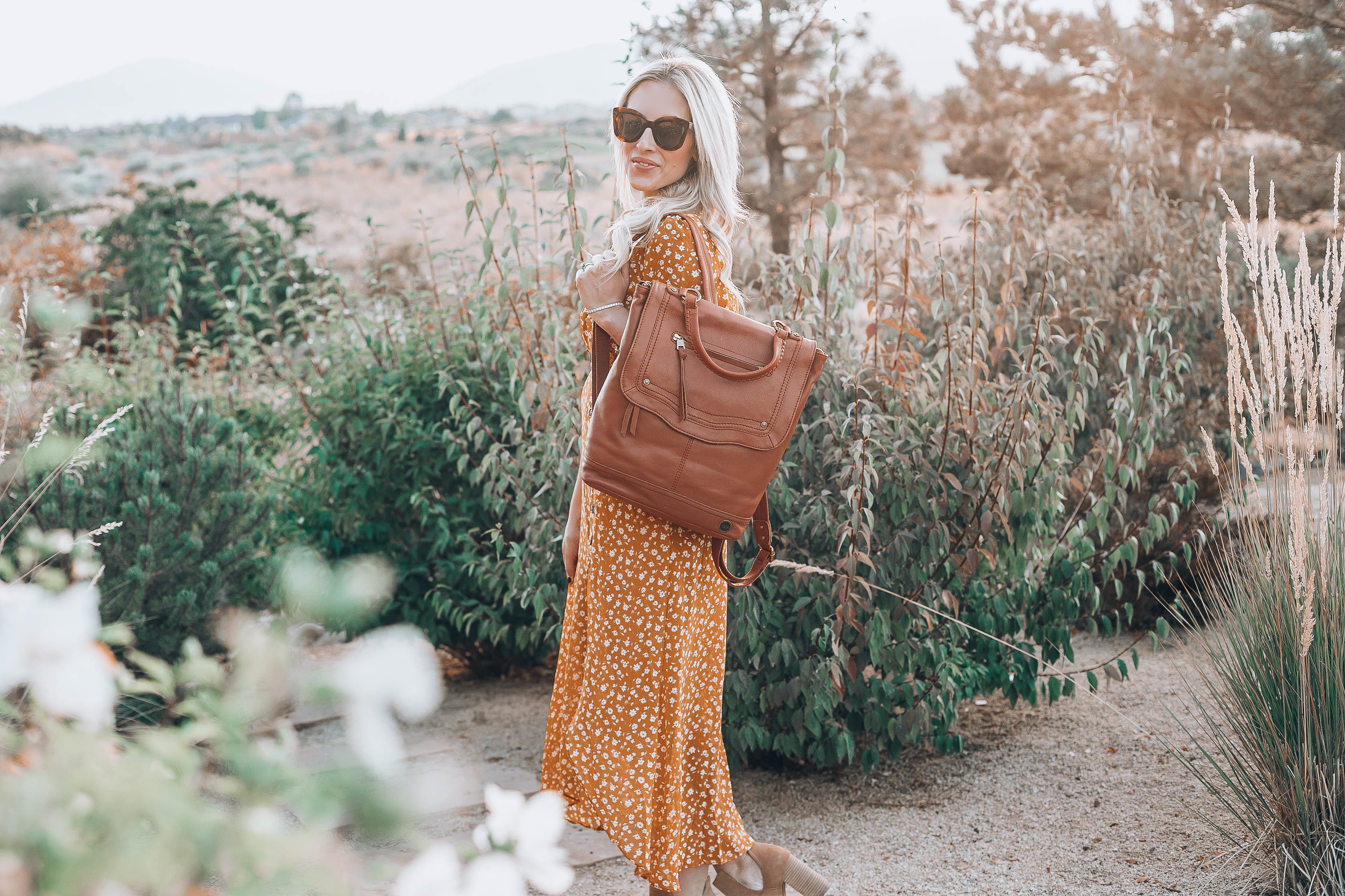 Emily Farren Wieczorek of Two Peas in a Prada talks about her go to tote for fall, the Tahoe Backpack by the Sak via Zappos.