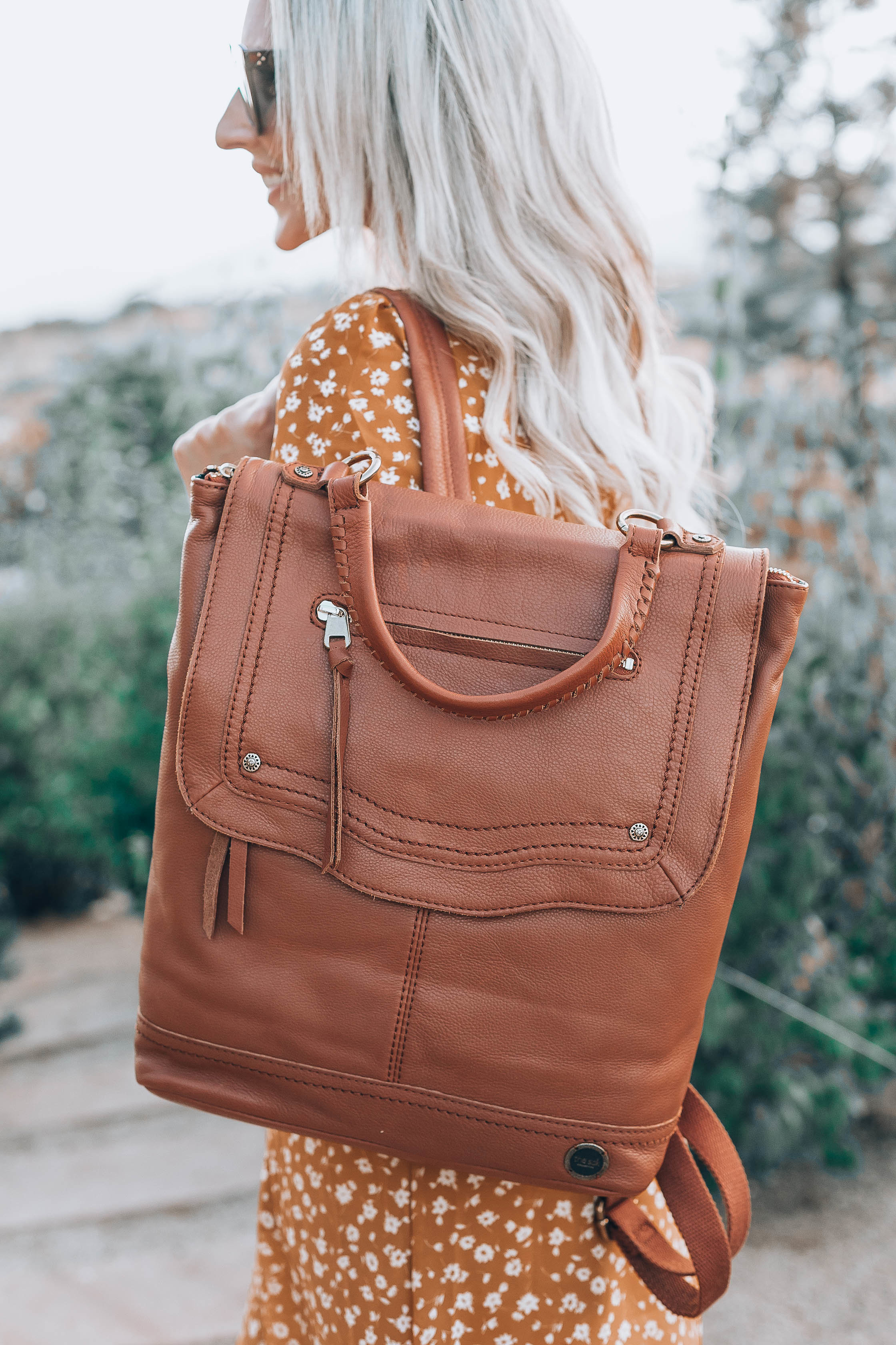 Emily Farren Wieczorek of Two Peas in a Prada talks about her go to tote for fall, the Tahoe Backpack by the Sak via Zappos.