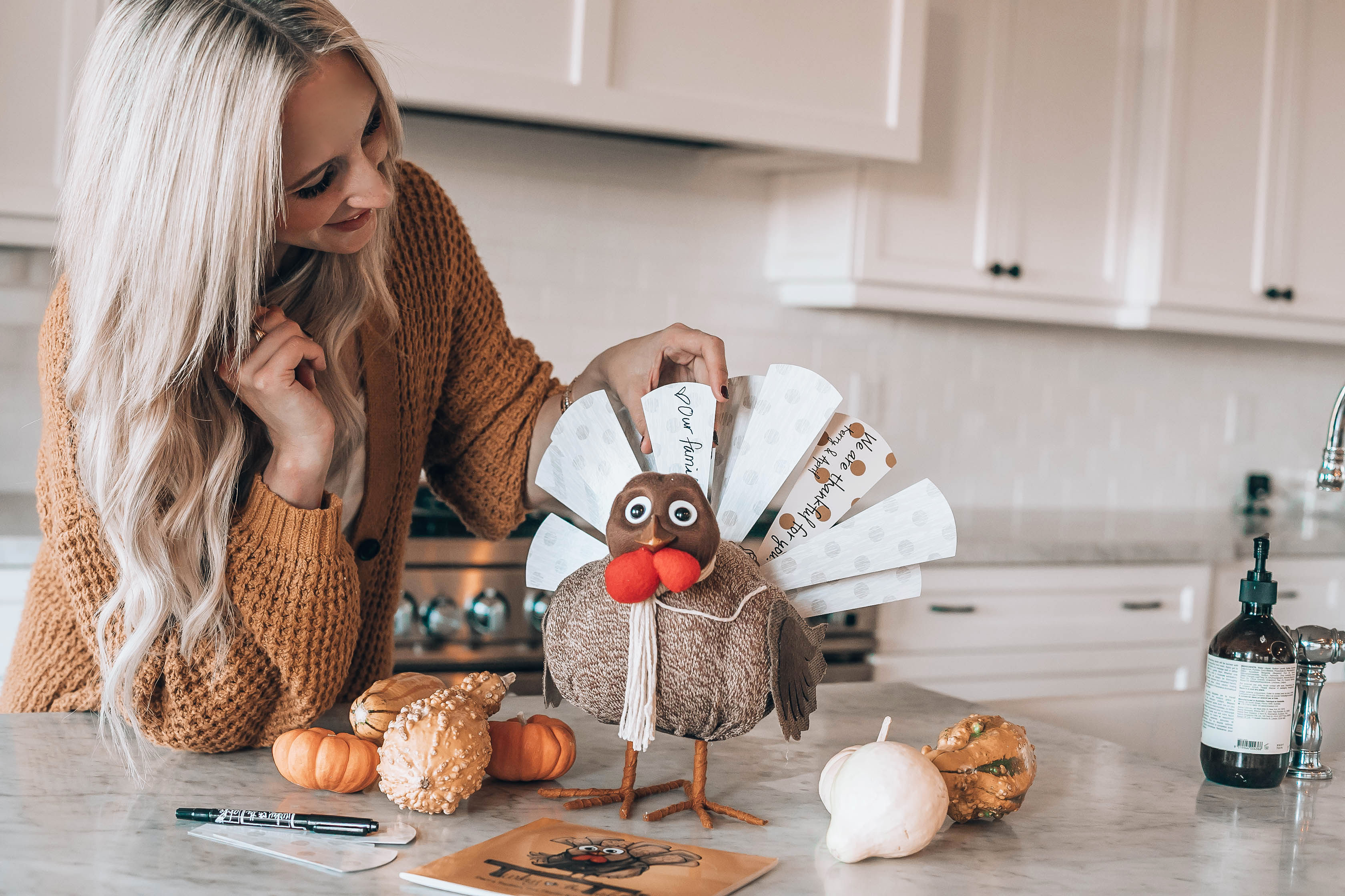 Emily Farren Wieczorek of Two Peas in a Prada talks about her new Thanksgiving tradition - Turkey on the Table - it teaches gratitude and gives meals to those in need.