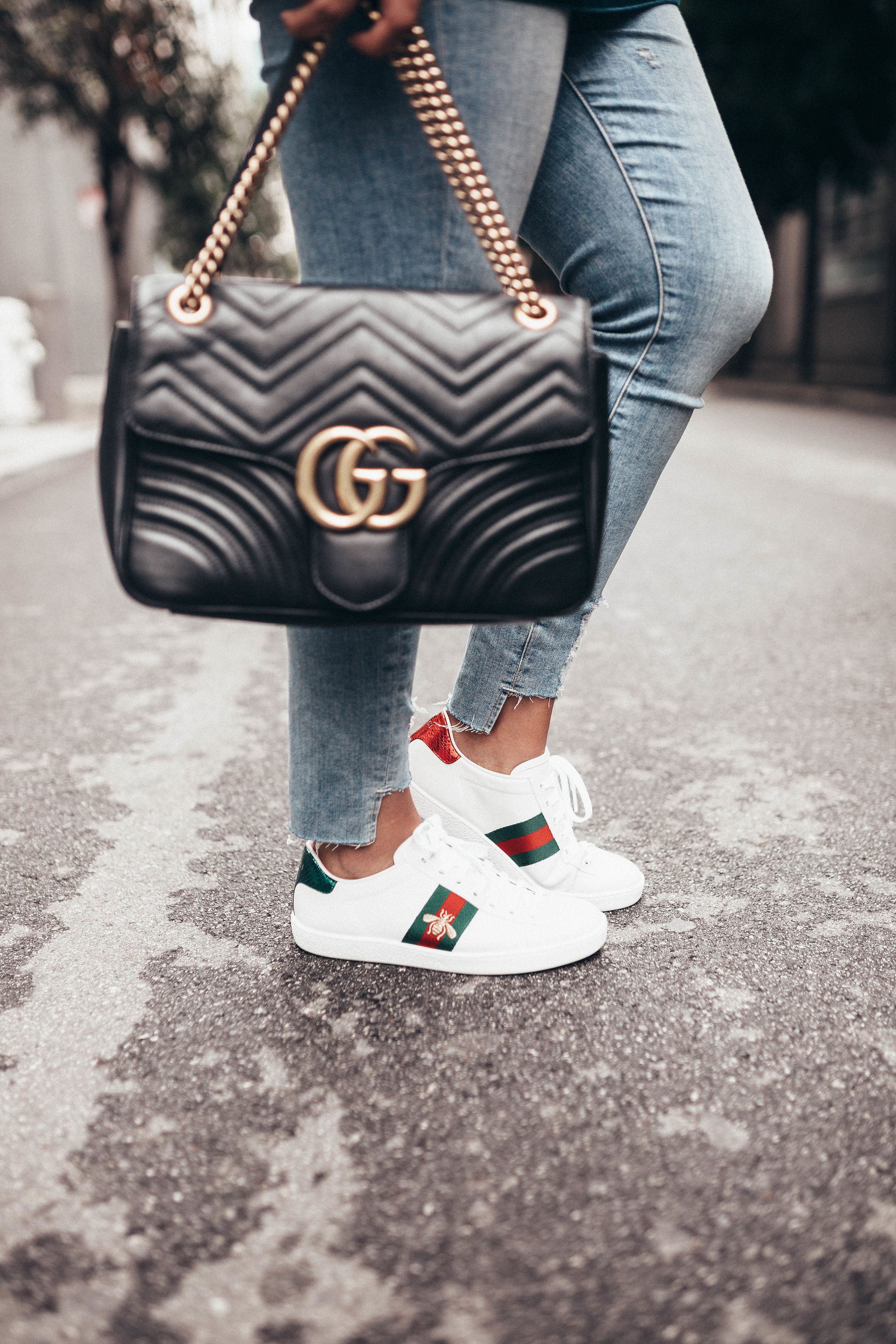 Ashley Zeal from Two Peas in a Prada shares how to clean Gucci sneakers. She is using the Jason Markk shoe kit that's only $30!