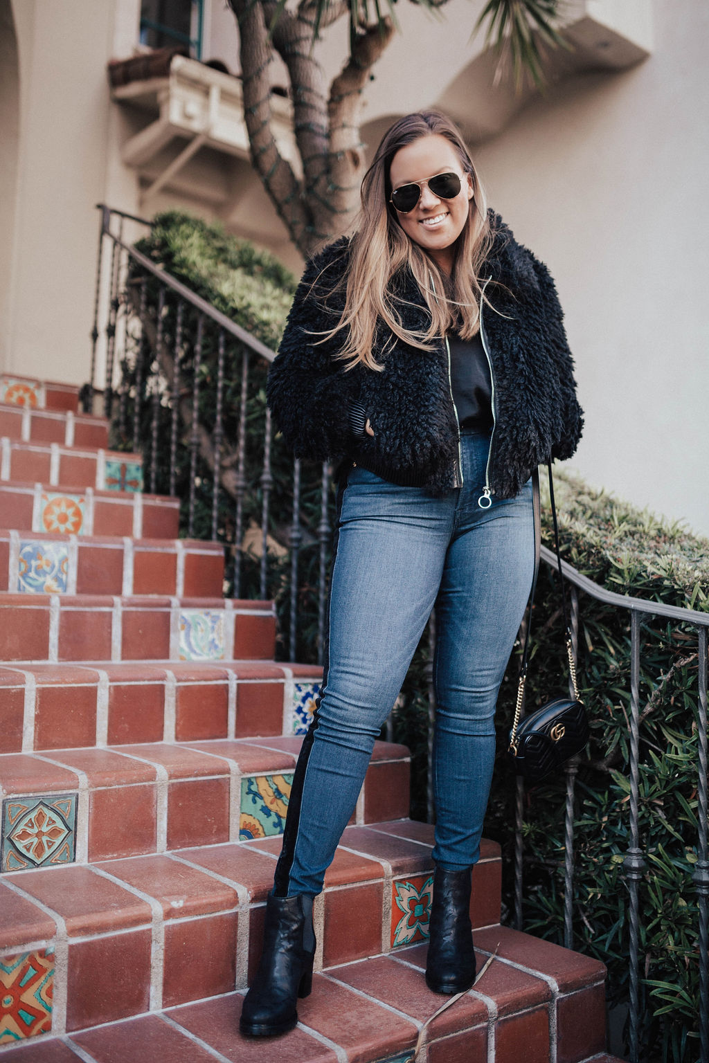 San Francisco blogger, Ashley Zeal, from Two Peas in a Prada shares her favorite stylish winter boots. She is wearing Ross & Snow available on Zappos.com. 