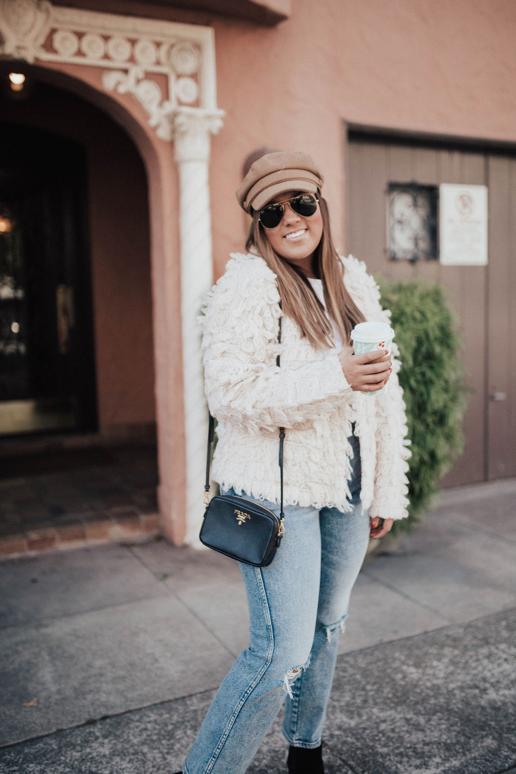 San Francisco blogger Ashley Zeal from Two Peas in a Prada shares a shaggy open cardigan from Nordstrom. It's available in two colors, and in stock in all sizes. 
