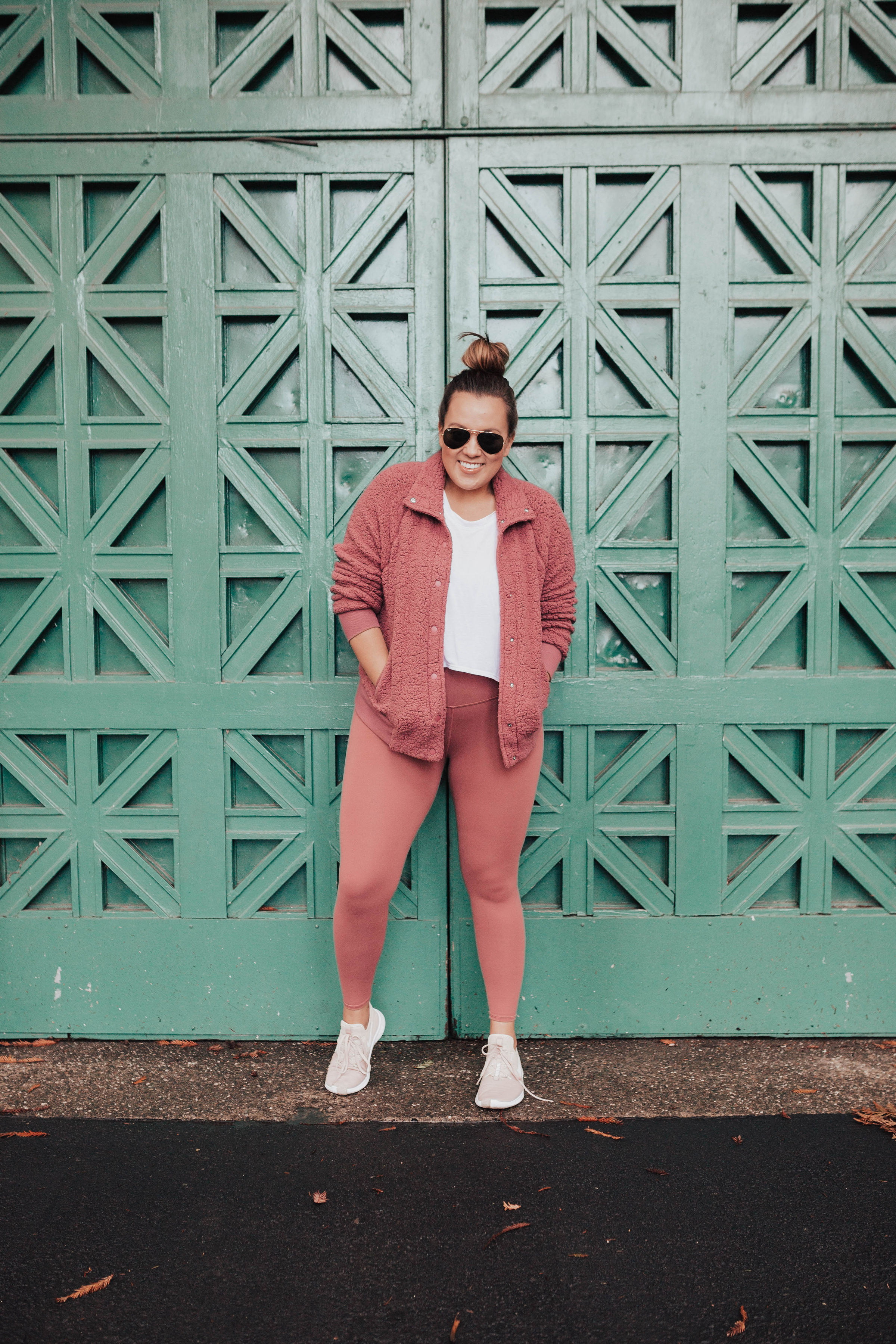 San Francisco blogger, Ashley Zeal, partners with Nordstrom to share her favorite winter activewear. She is wearing a Zella jacket, Alo leggings and Nike sneakers. 