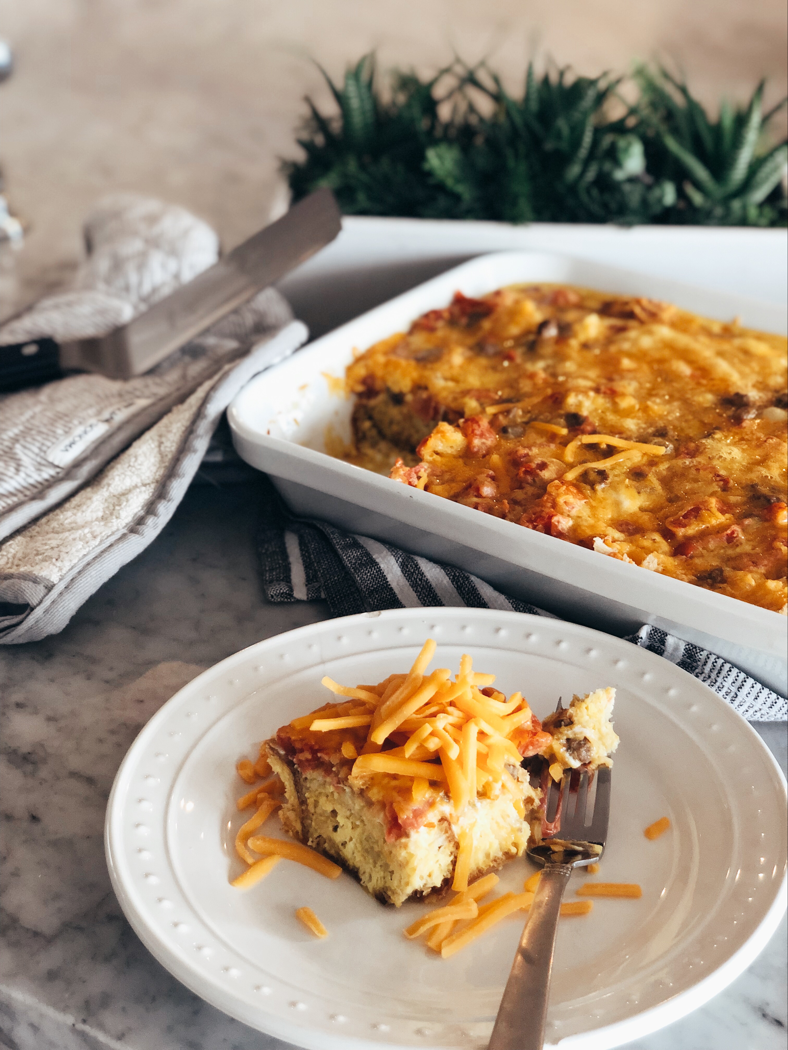 The perfect breakfast for a crowd! Reno Nevada Blogger, Emily Farren Wieczorek shares her easy make ahead breakfast casserole recipe! 
