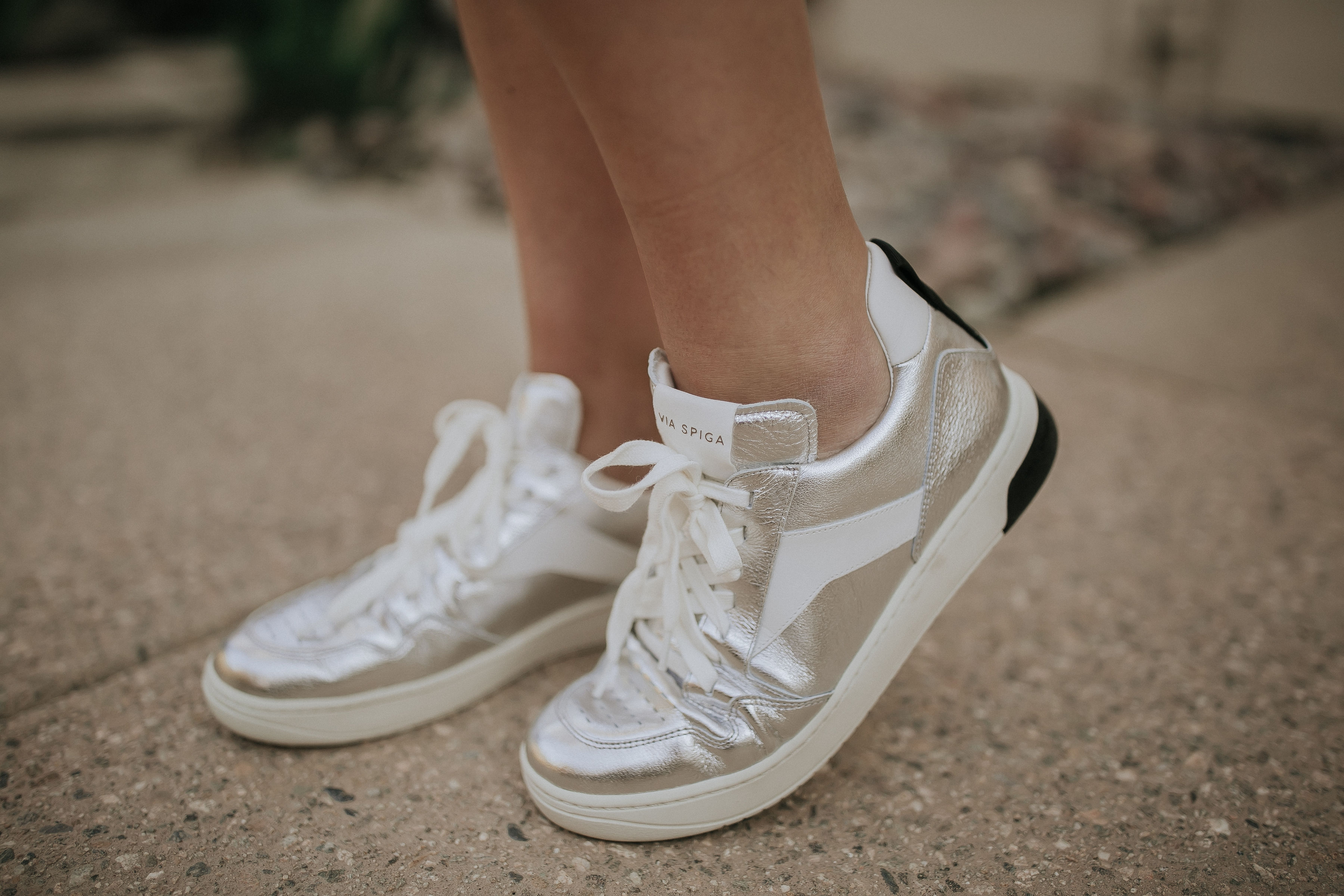 San Francisco Blogger, Ashley Zeal, from Two Peas in a Prada shares the best metallic sneakers for spring: the Lowrie by Via Spiga.