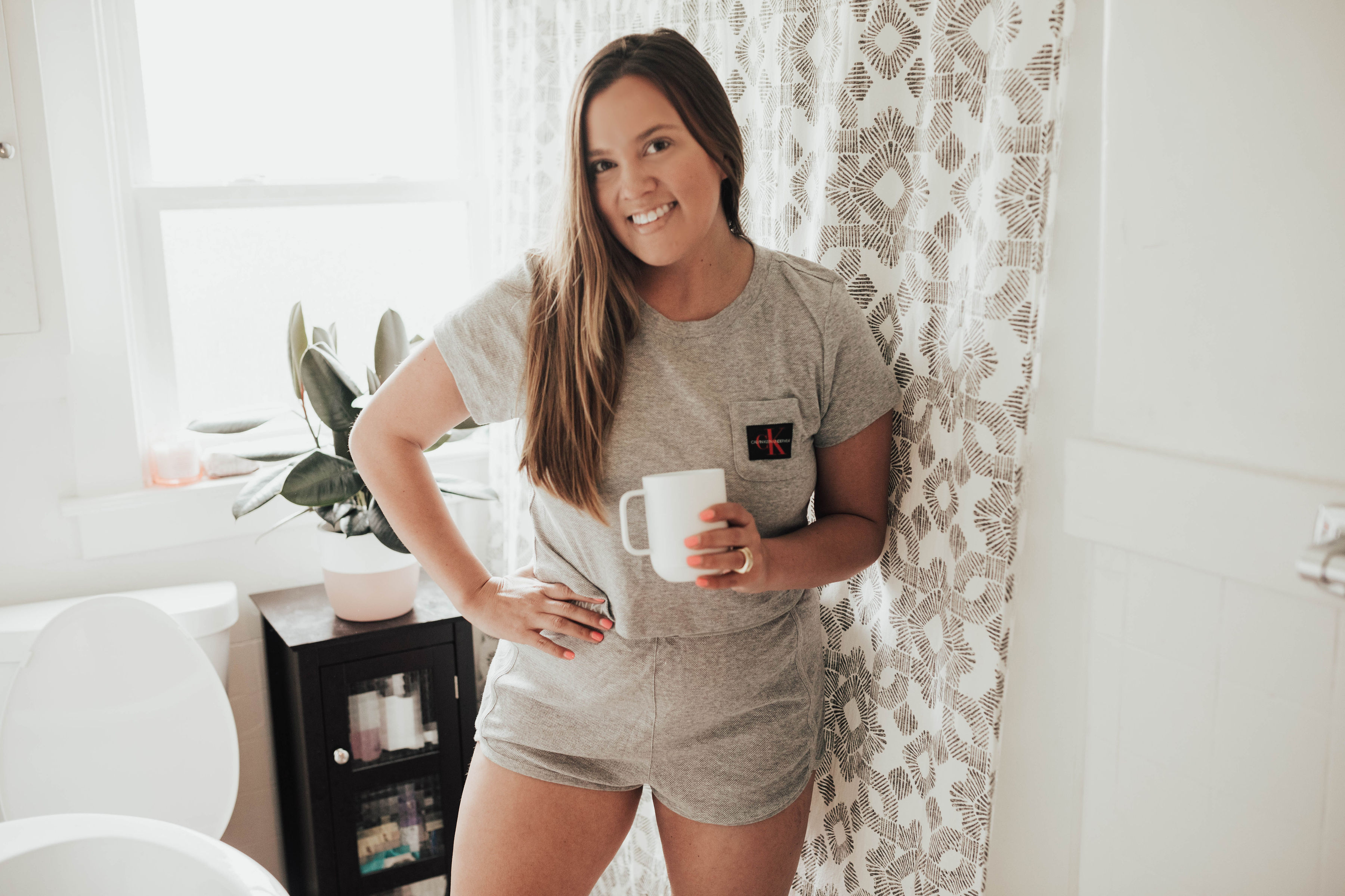 San Francisco blogger, Ashley Zeal, from Two Peas in a Prada shares her morning routine. She is wearing a Calvin Klein set from Zappos. 