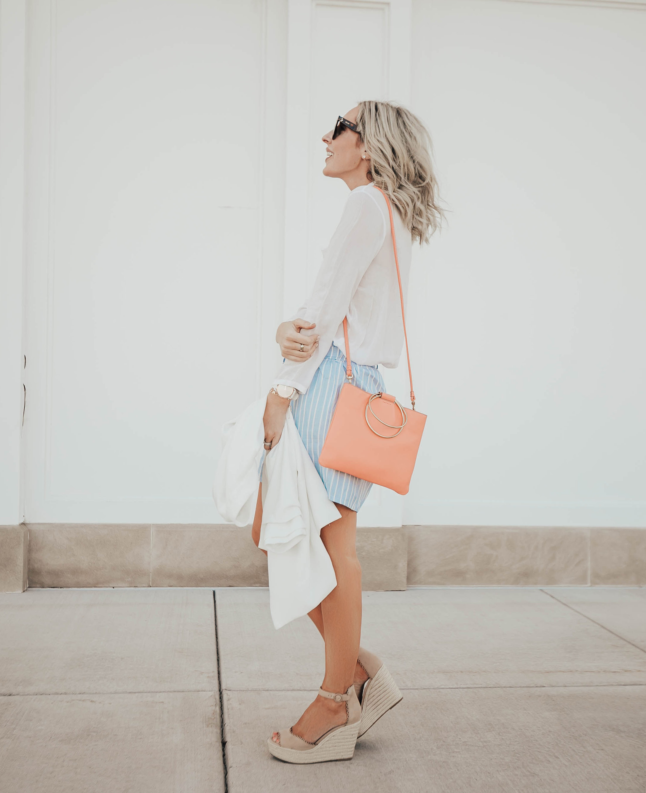 Reno Nevada Blogger, Emily Farren Wieczorek of Two Peas in a Prada shares her new addition to her handbag collection - a coral stunner from Thacker via Zappos