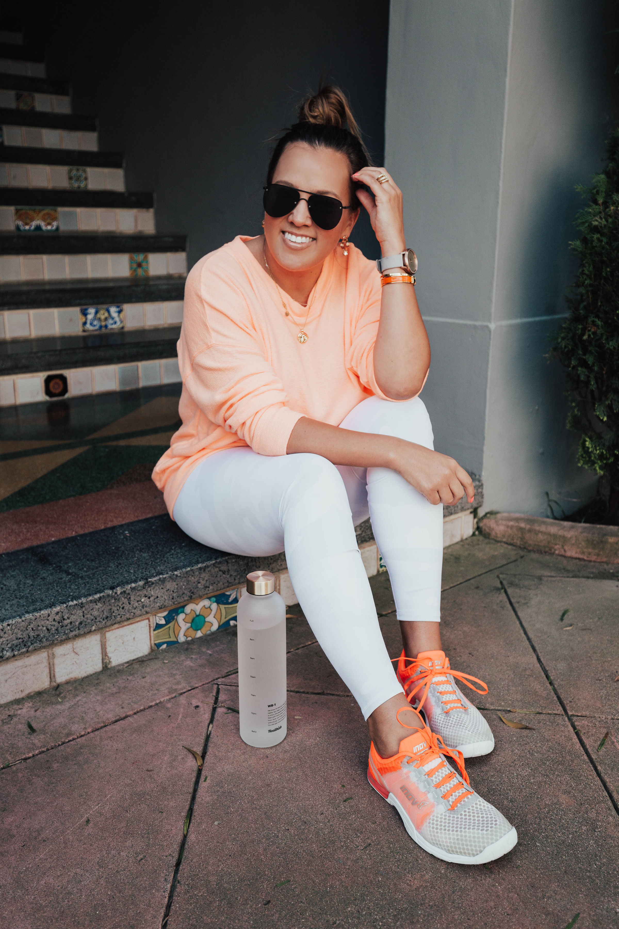 San Francisco blogger Ashley Zeal from Two Peas in a Prada shares her new neon sneakers. She is sharing why these shoes from Inov-8 make for the perfect cross trainer!
