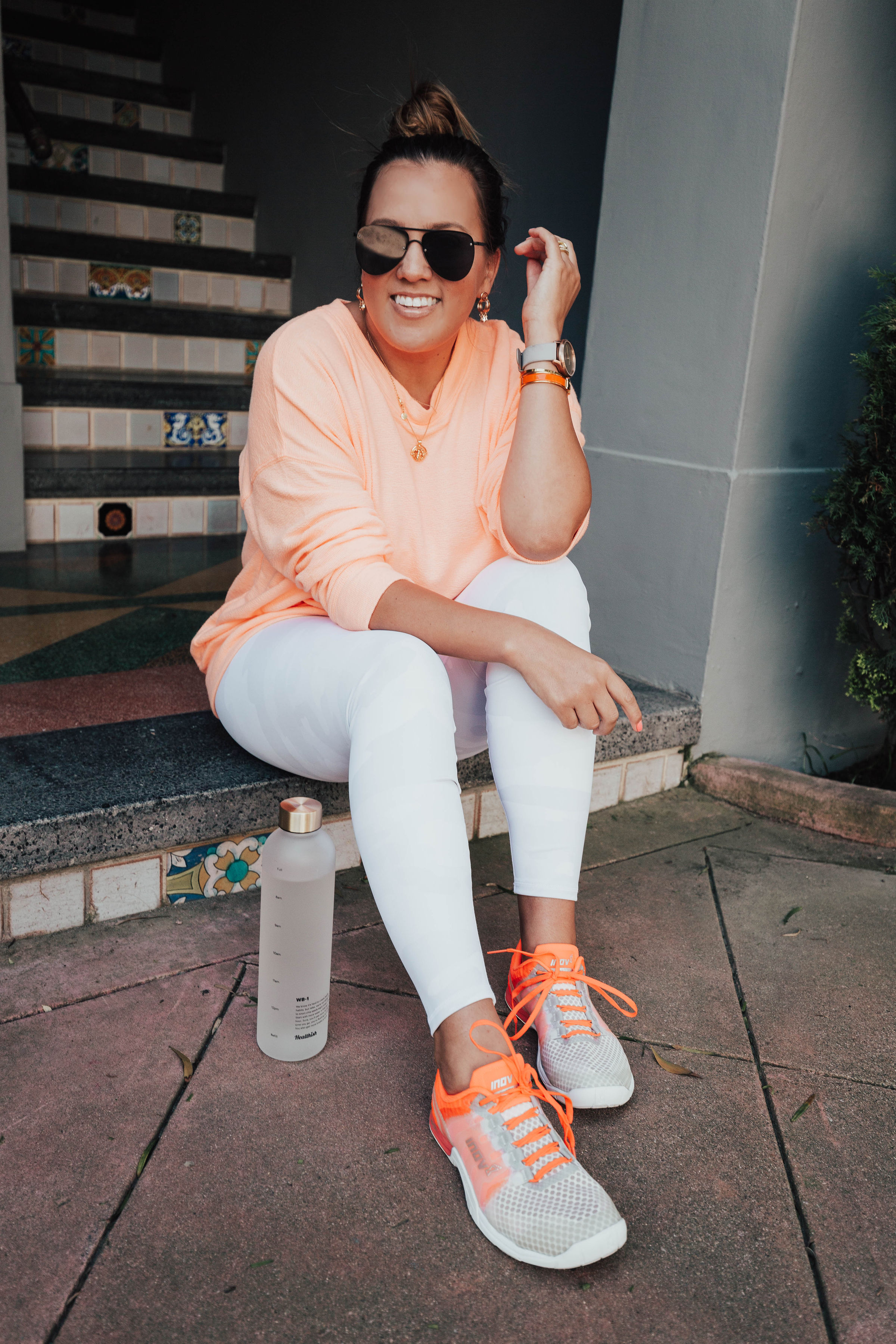 San Francisco blogger Ashley Zeal from Two Peas in a Prada shares her new neon sneakers. She is sharing why these shoes from Inov-8 make for the perfect cross trainer!