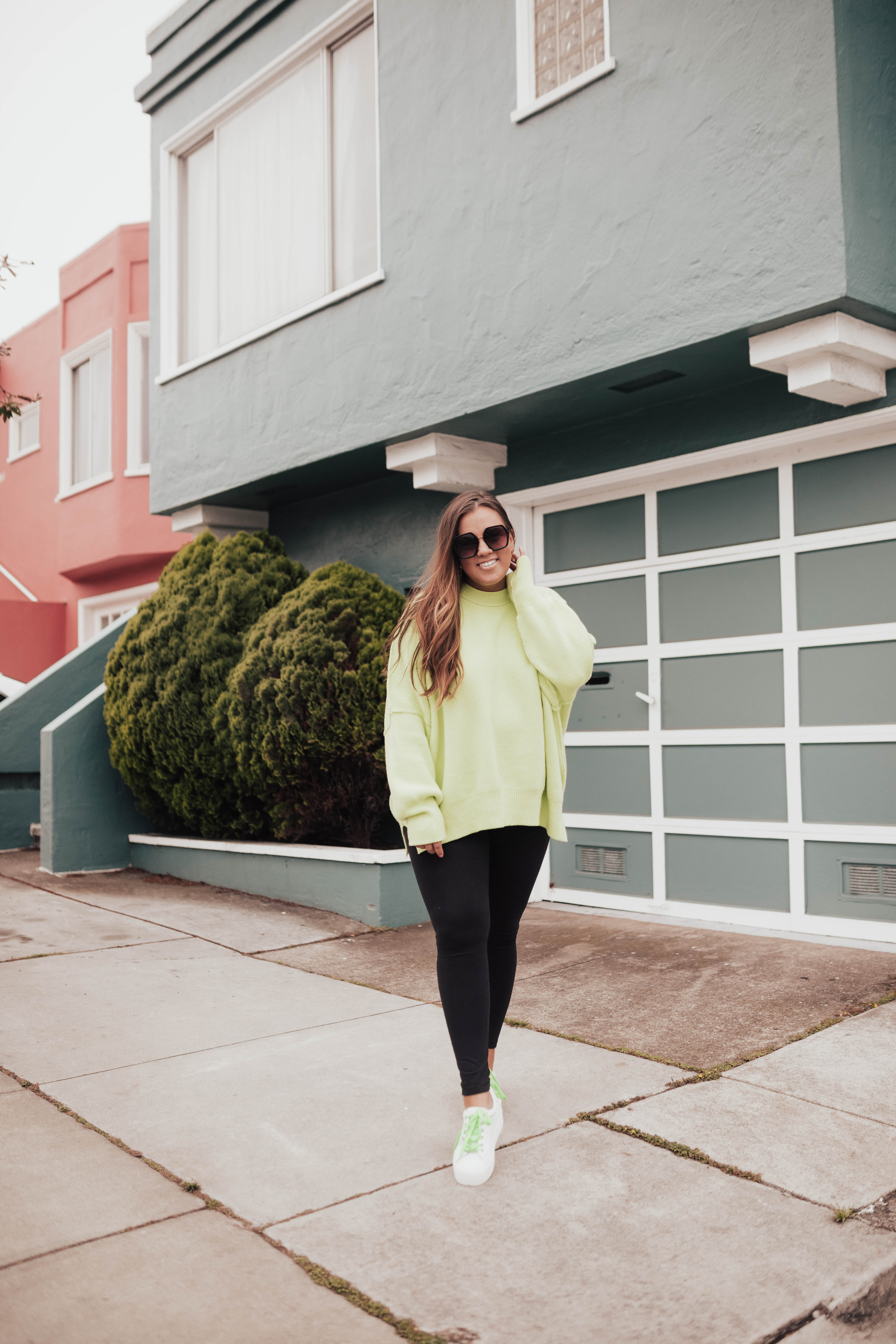 San Francisco blogger Ashley Zeal from Two Peas in a Prada shares her new sneakers from JSlides. She is wearing head to toe Zappos!