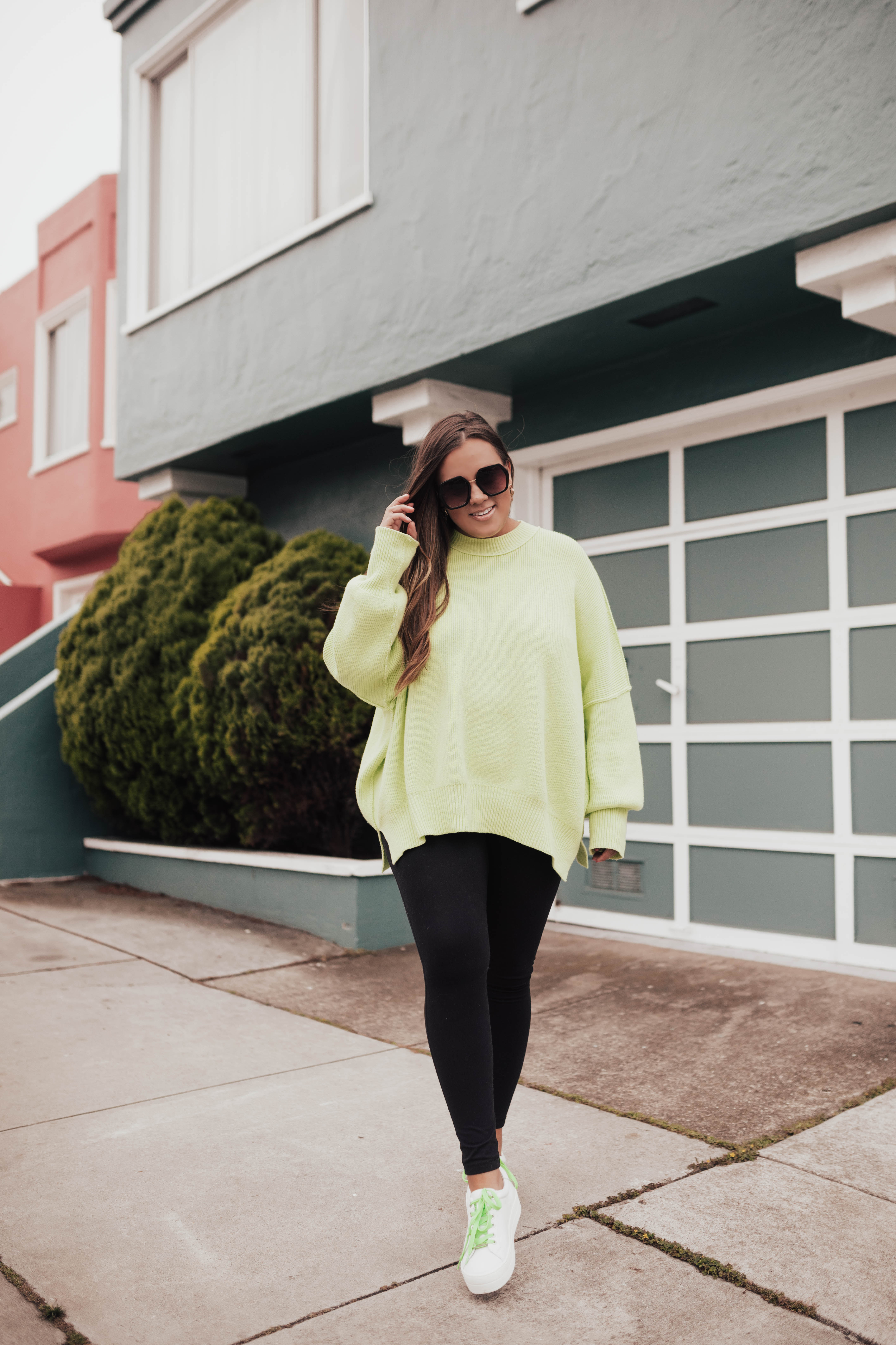 San Francisco blogger Ashley Zeal from Two Peas in a Prada shares her new sneakers from JSlides. She is wearing head to toe Zappos!