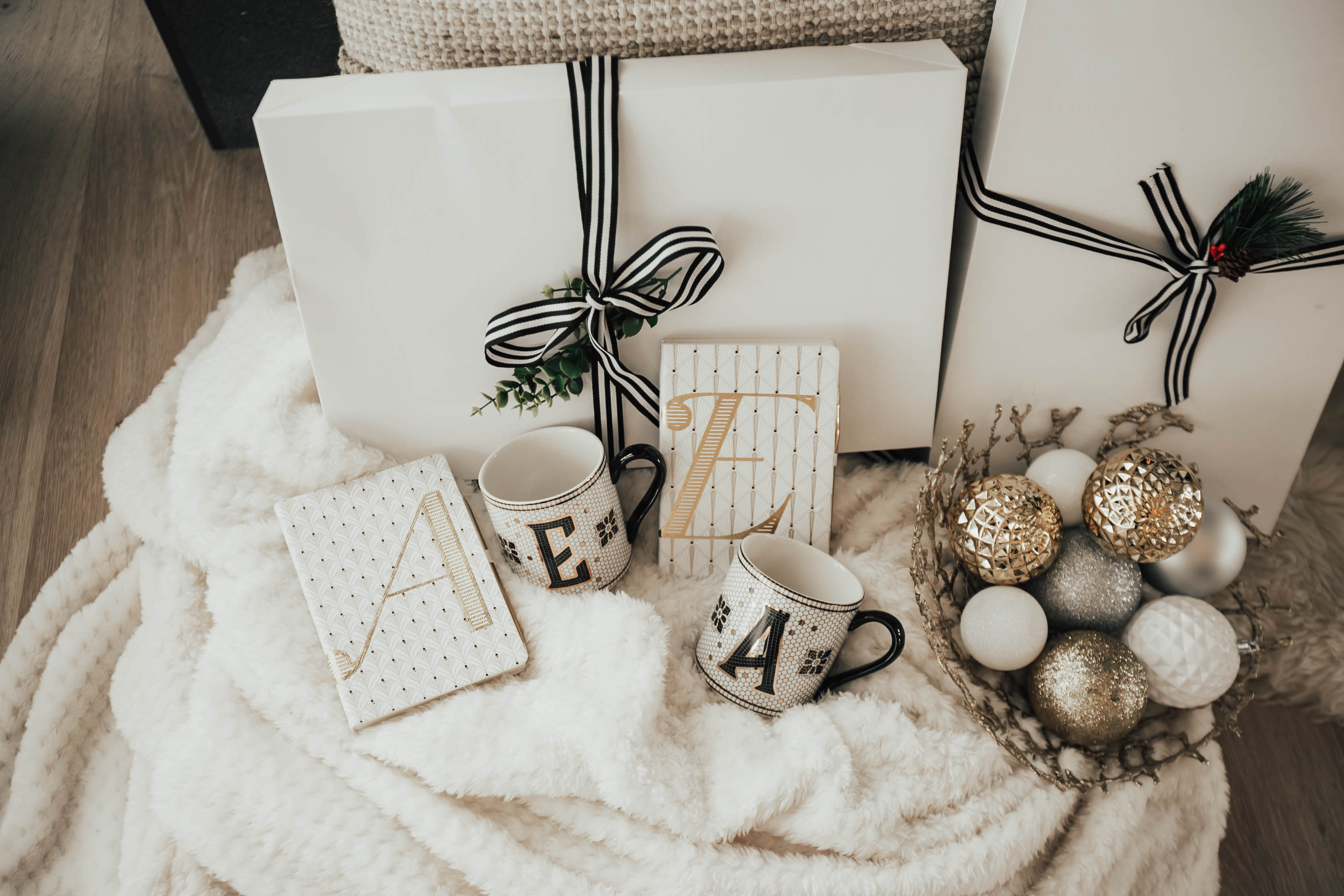 Bloggers Ashley Zeal and Emily Wieczorek from Two Peas in a Prada share their Gift Guide for your Bestie. They are sharing all the best gifts to buy you bff this holiday season!
