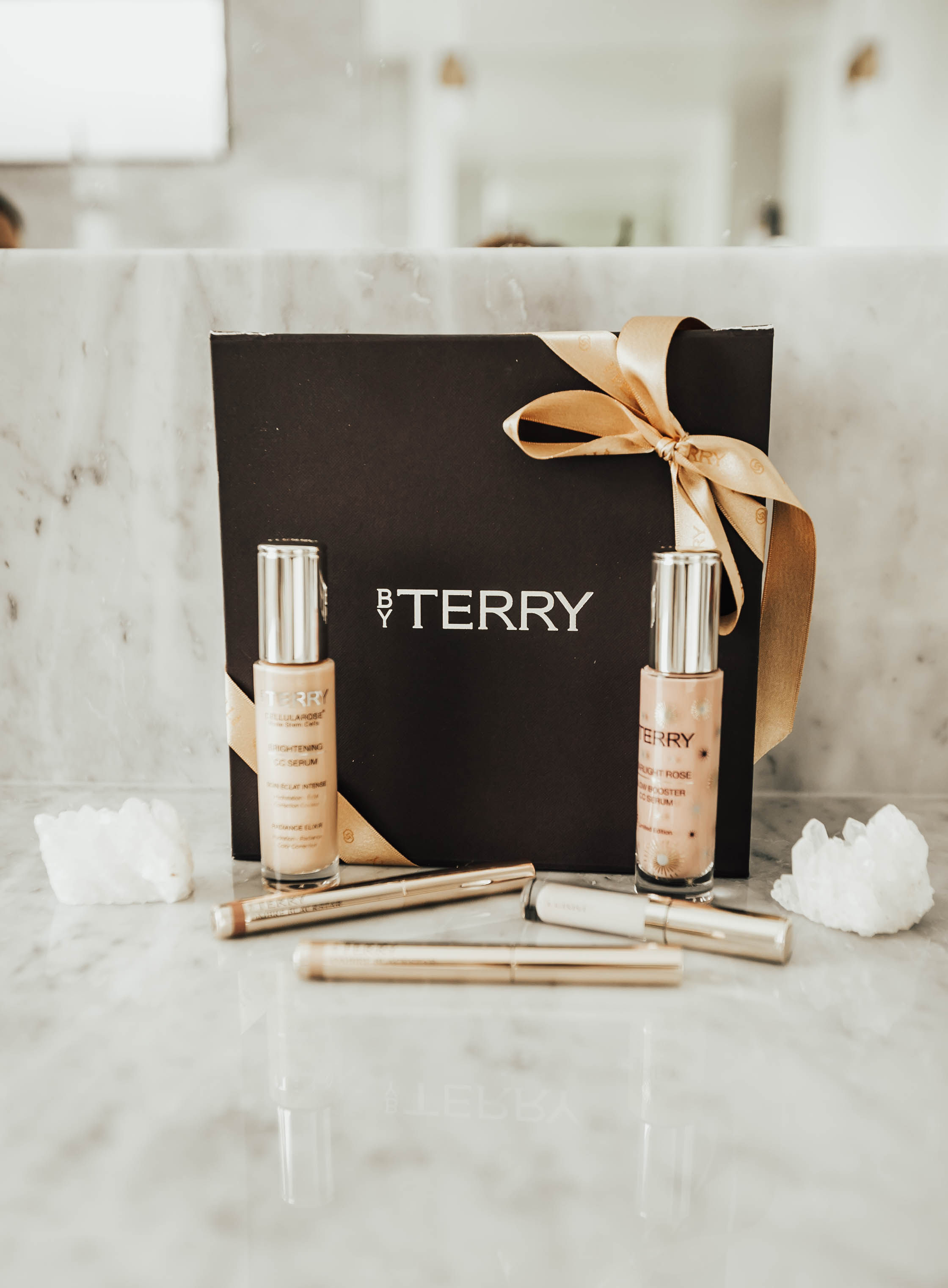 Reno blogger Ashley Zeal from Two Peas in a Prada shares how she gets that winter glow under her makeup using By Terry products,