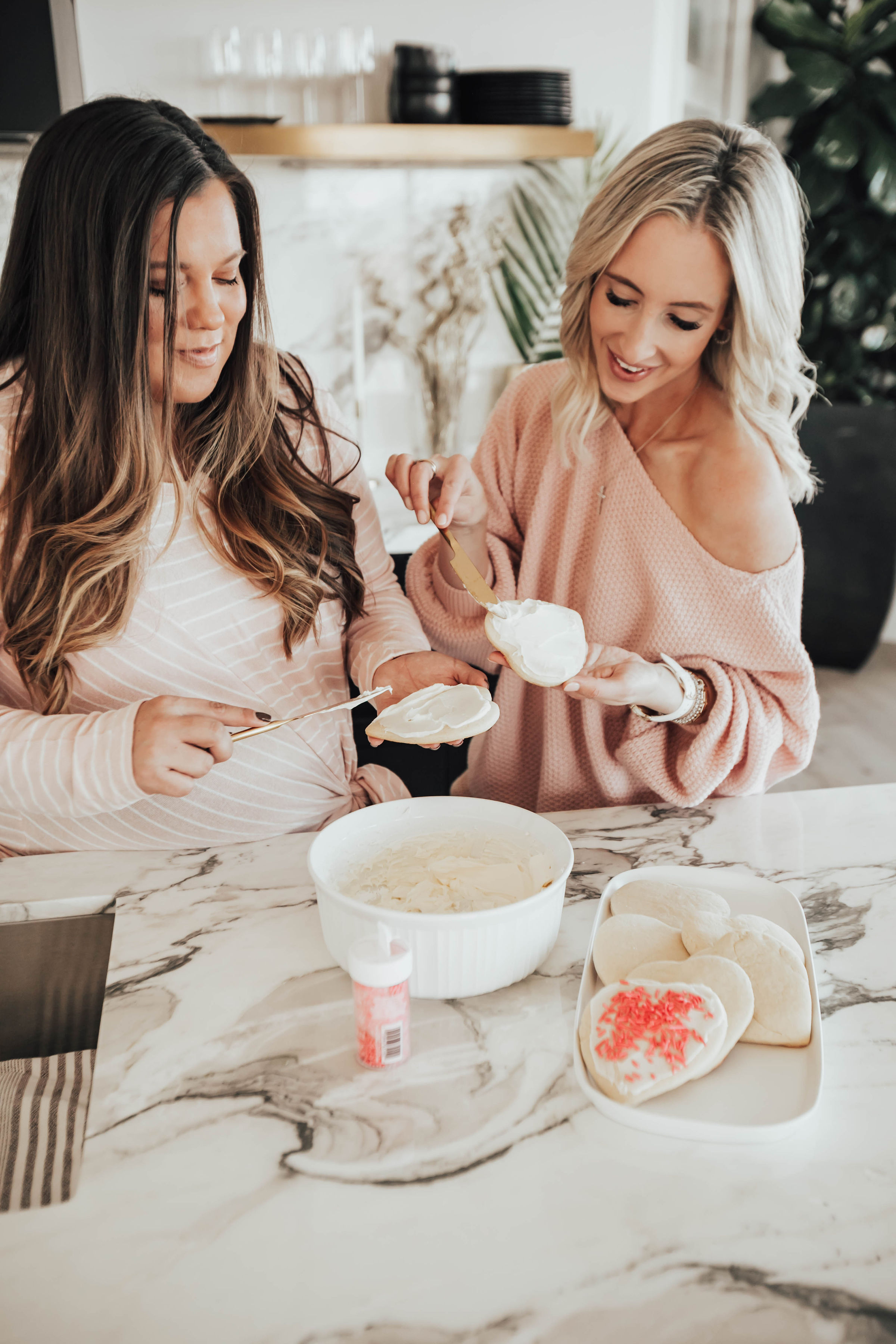 Emily Farren Wieczorek of the lifestyle blog Two Peas in a Prada shares her favorite recipe for fluffy sugar cookies in her Valentines Day Sugar Cookies recipe! 