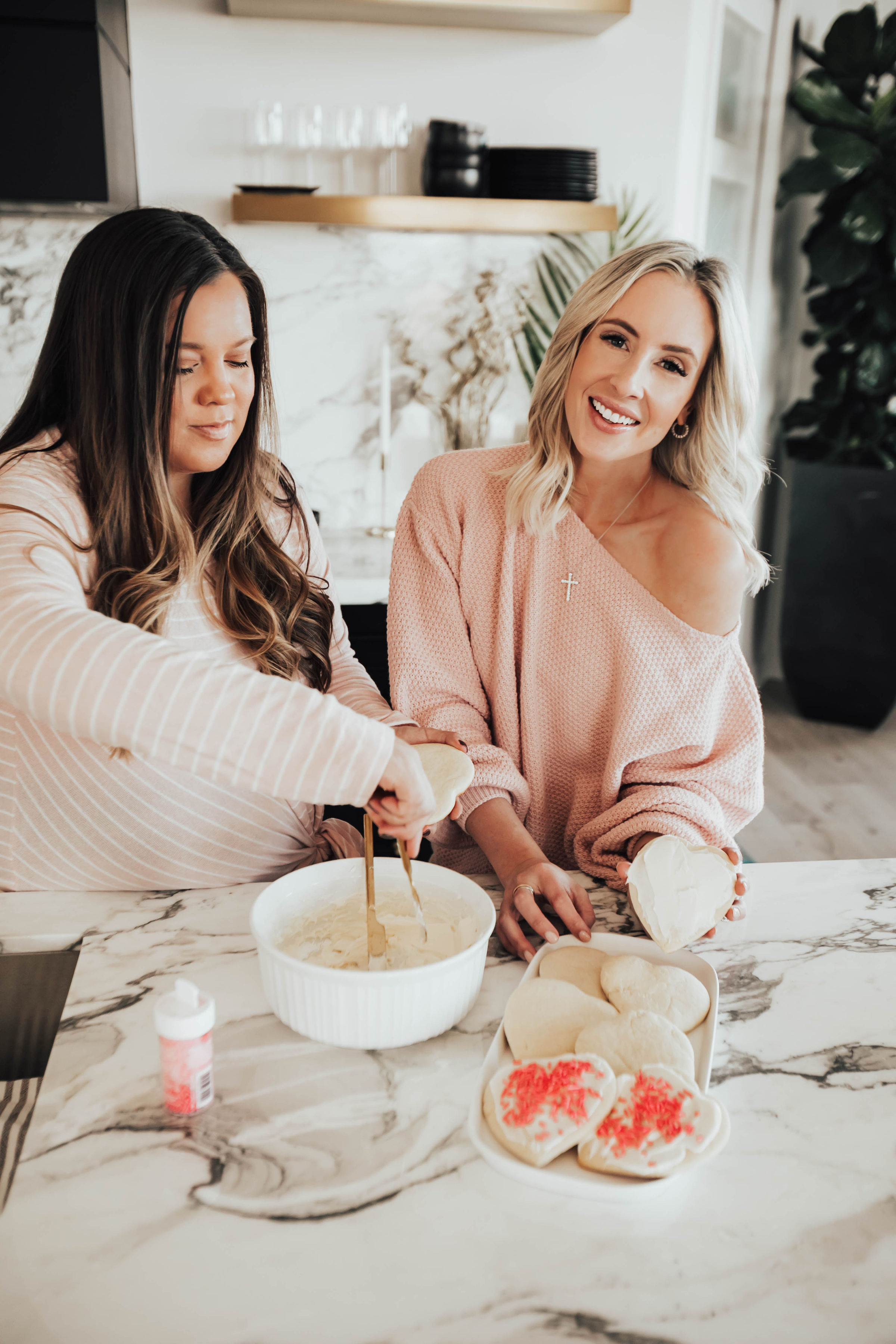 Emily Farren Wieczorek of the lifestyle blog Two Peas in a Prada shares her favorite recipe for fluffy sugar cookies in her Valentines Day Sugar Cookies recipe! 